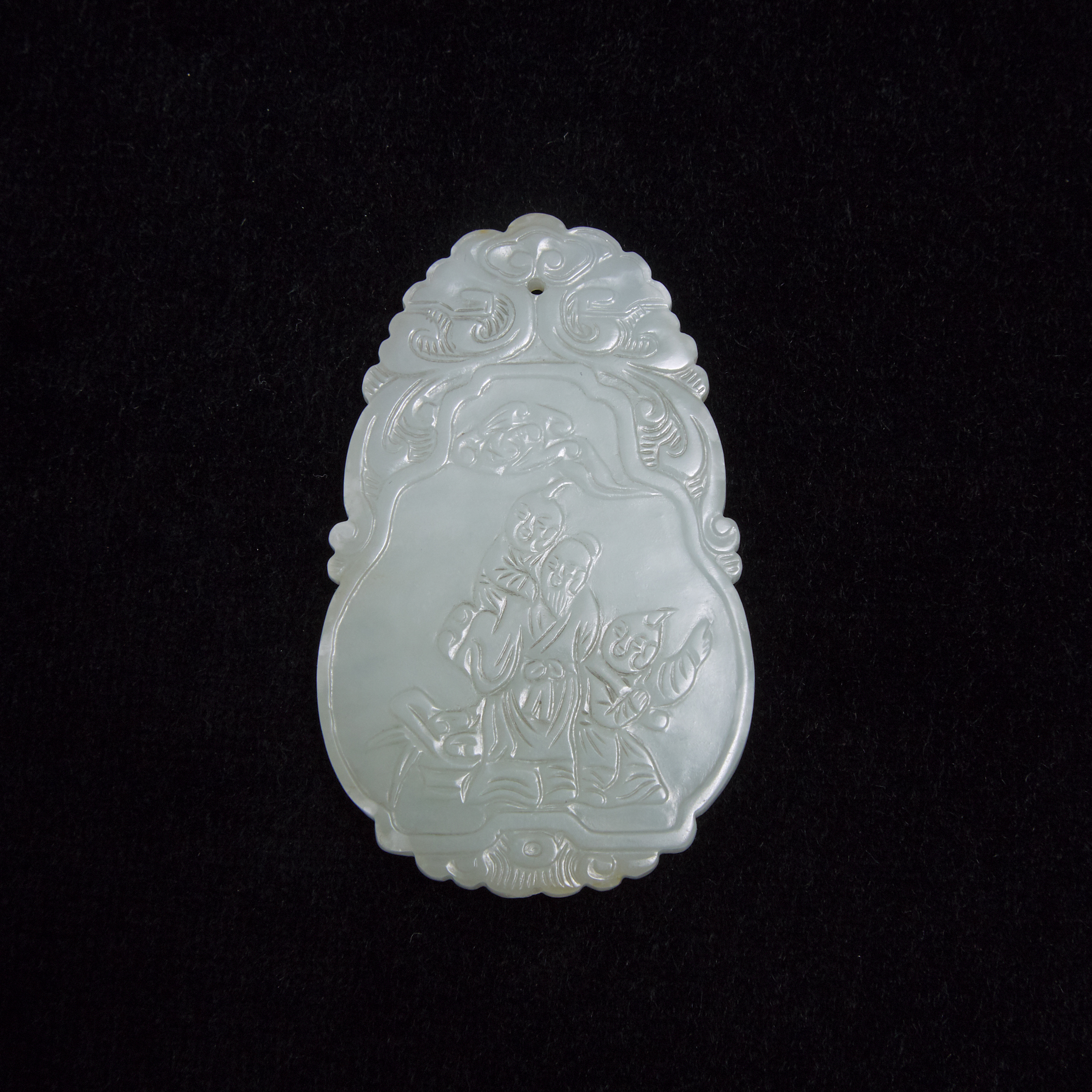 A White Jade Figural Plaque