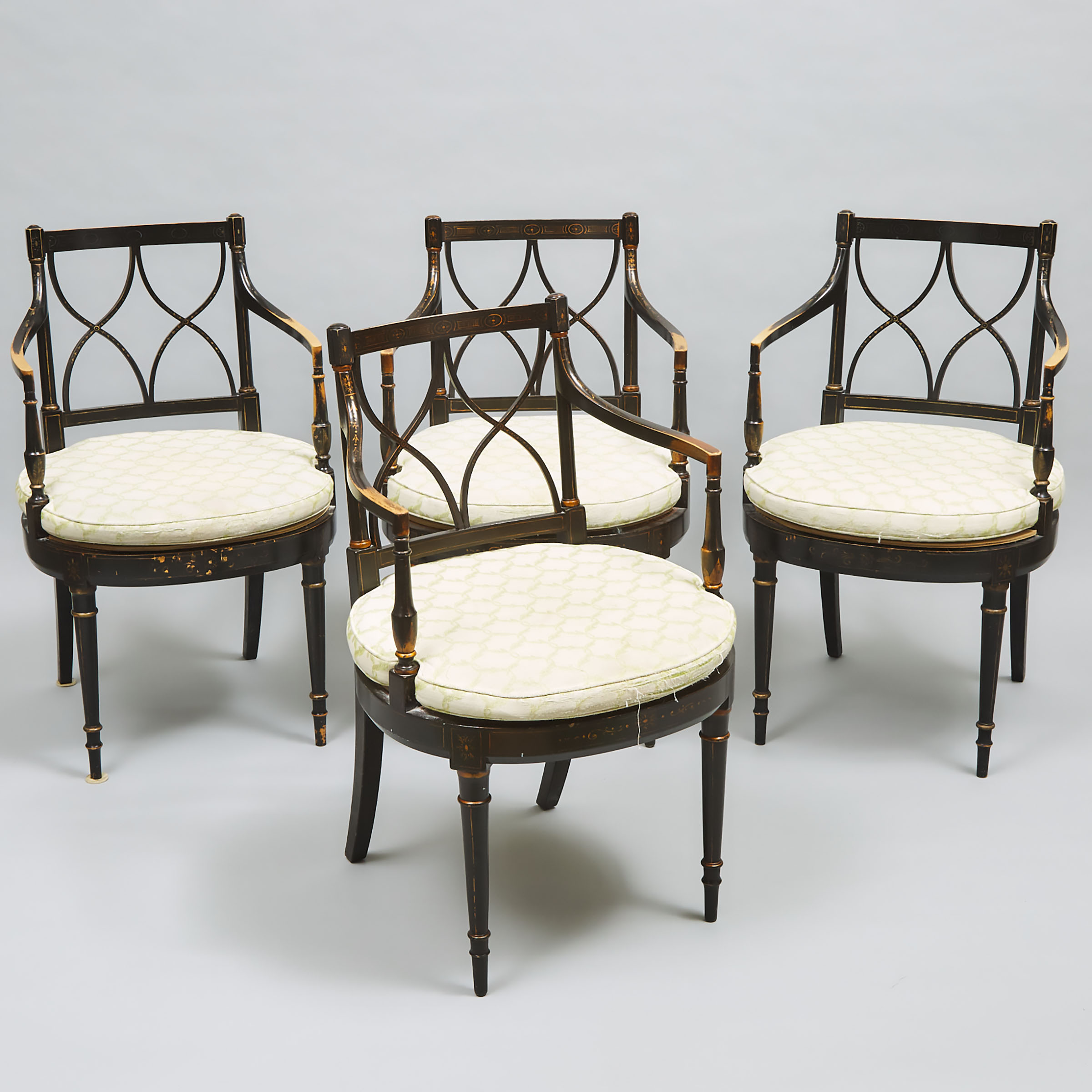 Set of Four Regency Style Parcel Gilt Ebonized Open Armchairs, early-mid 20th century