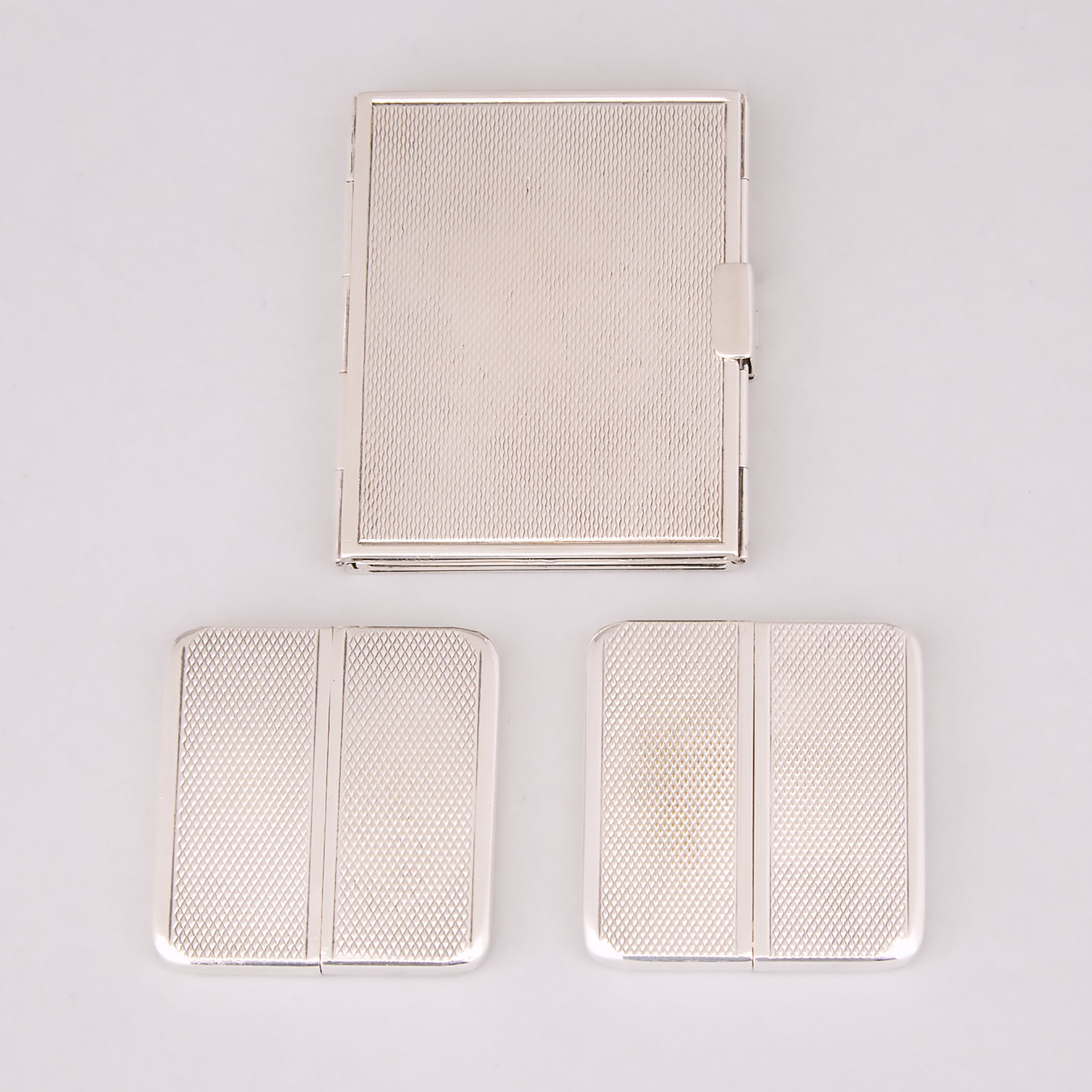 Continental Silver Triptych Pocket Photograph Frame and Two French Silver Plated Frames, 20th century