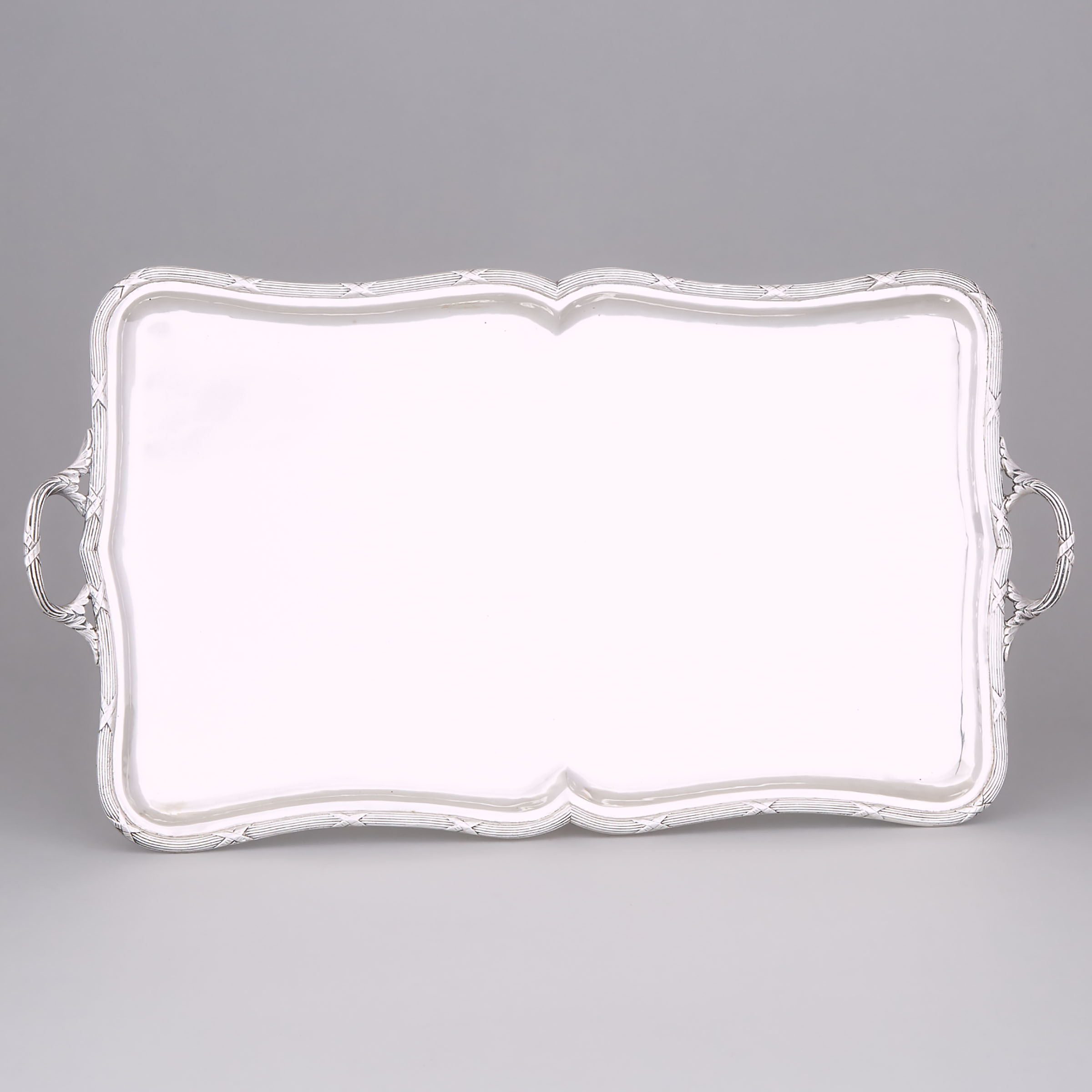 Middle-Eastern Silver Two-Handled Shaped Rectangular Serving Tray, 20th century