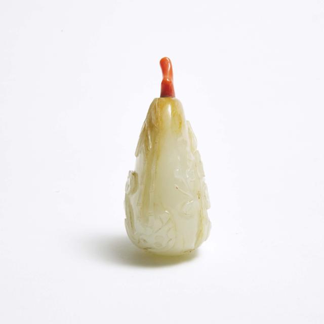 A Carved White Jade and Russet Pebble-Form Snuff Bottle, 18th Century 