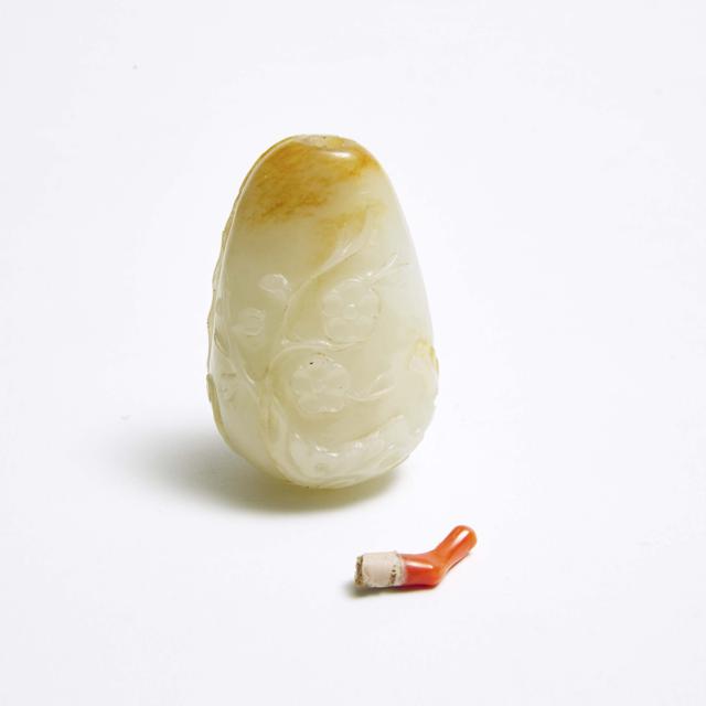 A Carved White Jade and Russet Pebble-Form Snuff Bottle, 18th Century 