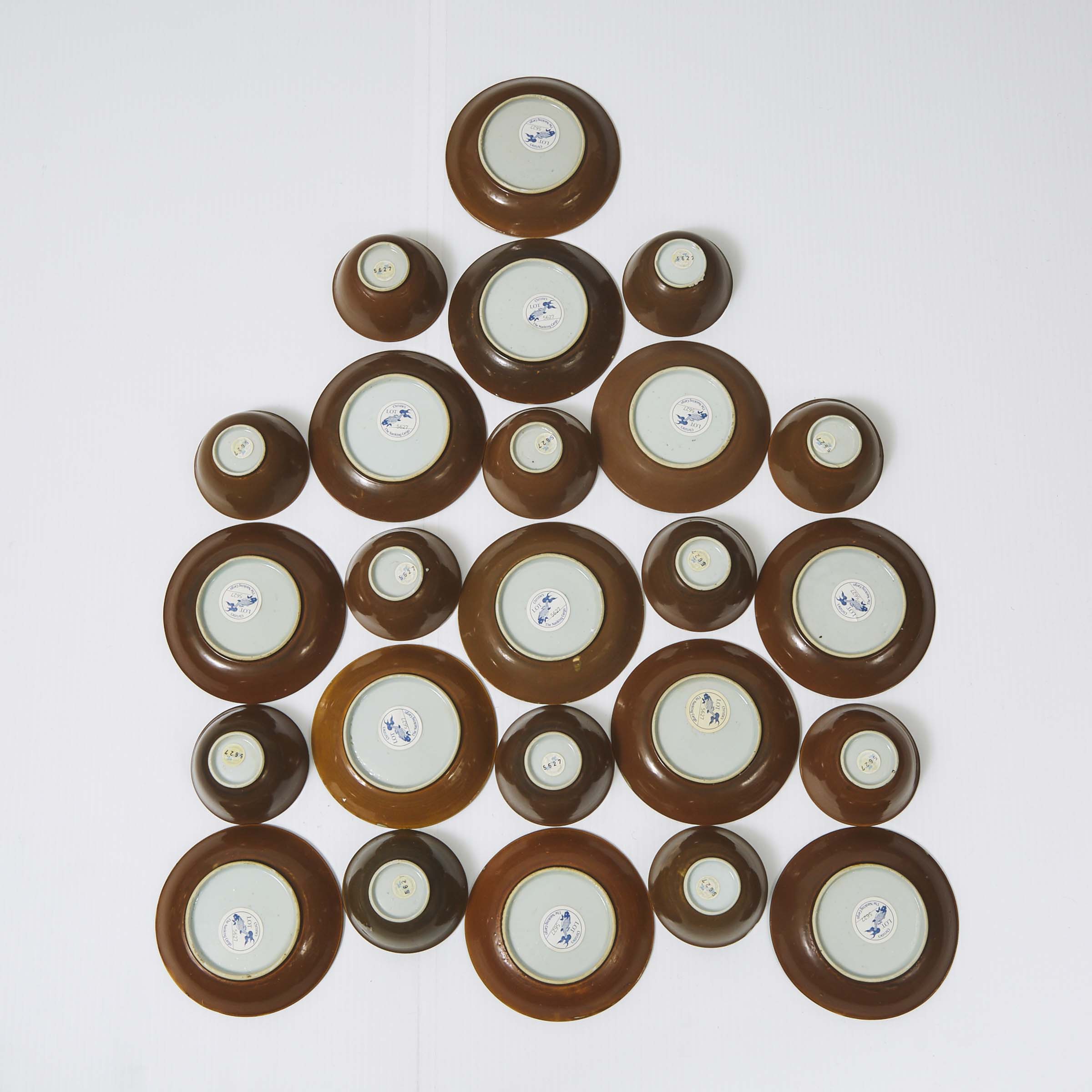 A Set of Twenty-Four 'Batavian Pavilion' Pattern Teabowls and Saucers from the Nanking Cargo, Qianlong Period, Circa 1750