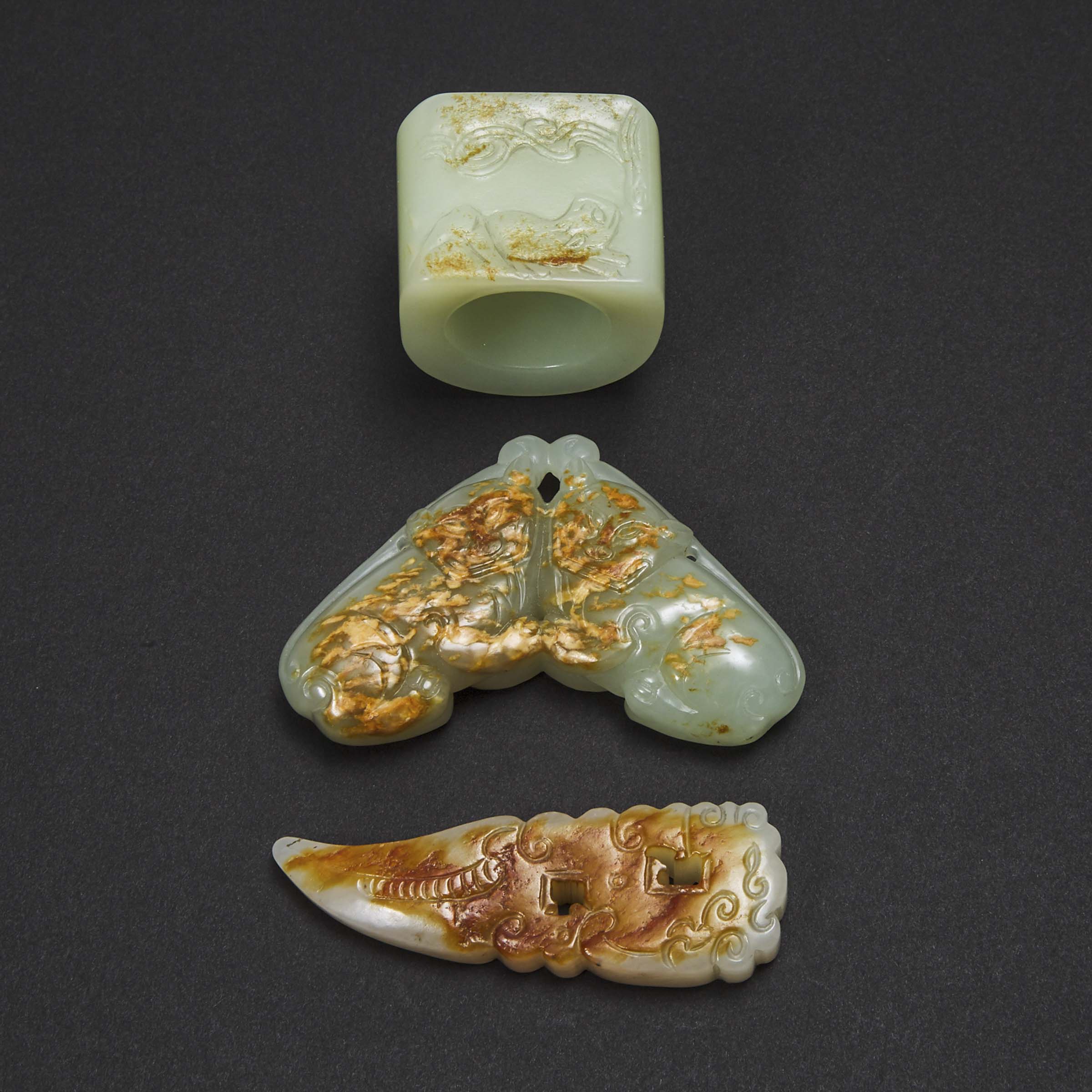 A Jade Archer's Ring, 'Xi' Pendant, and 'Lion' Chime-Shaped Pendant