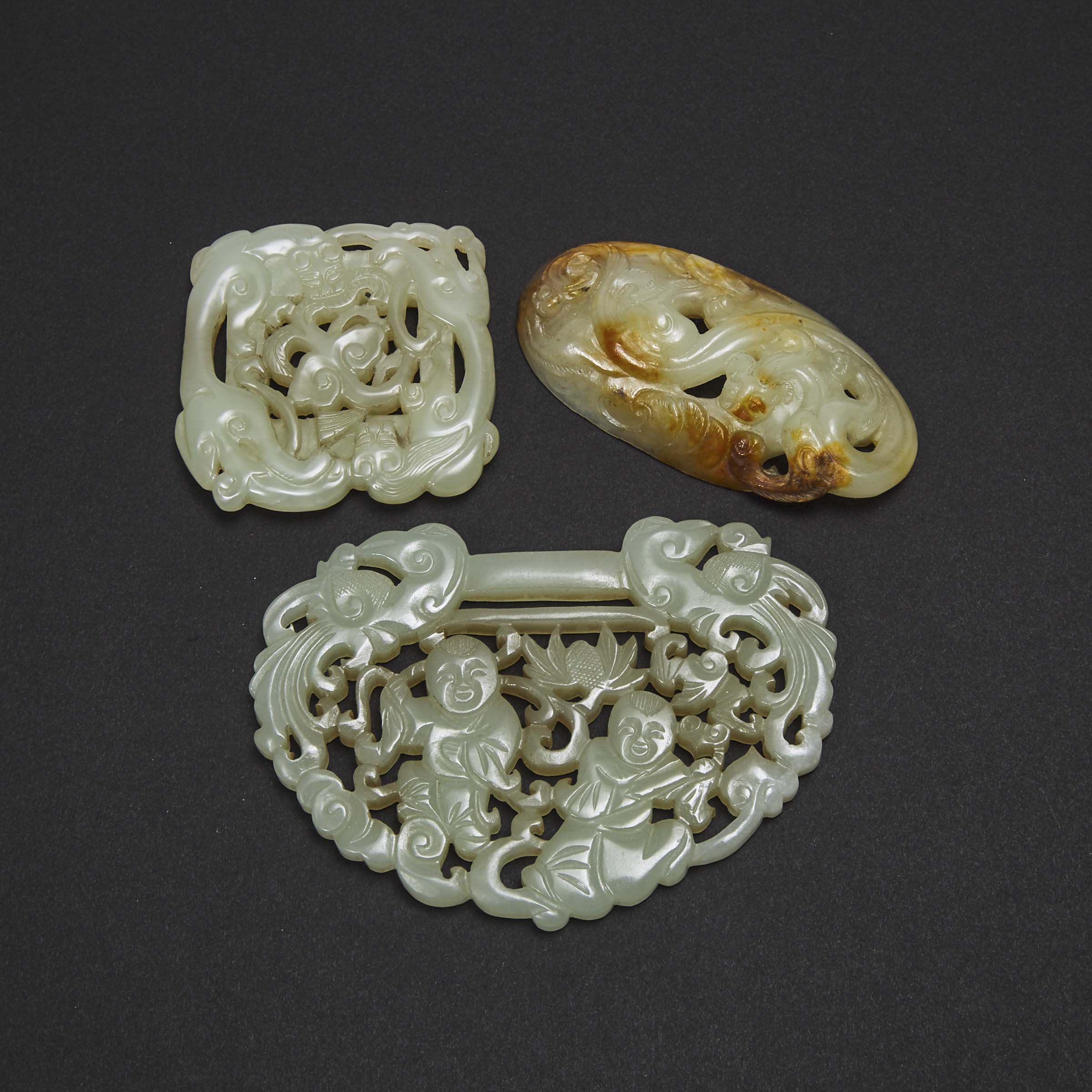 A Group of Three Reticulated Jade Carvings