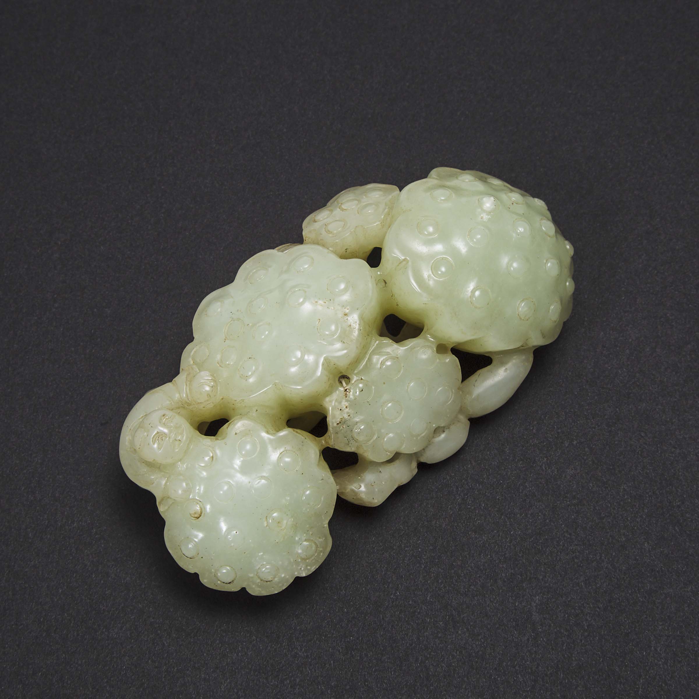 A Pale Celadon Jade 'Lotus' Group Carving