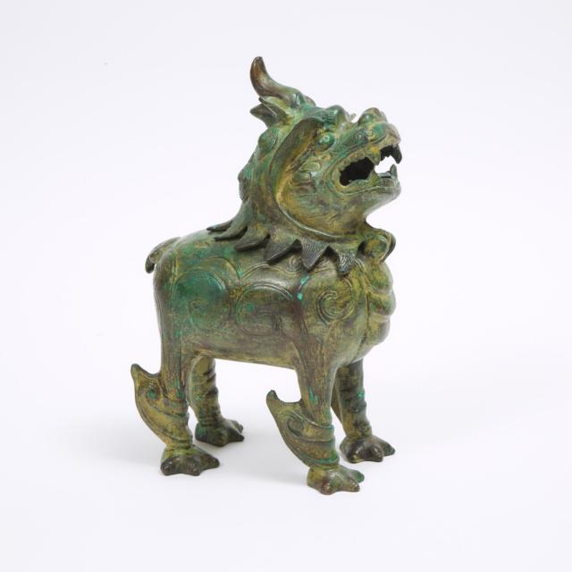 A Chinese Bronze Beast Mounted Lamp