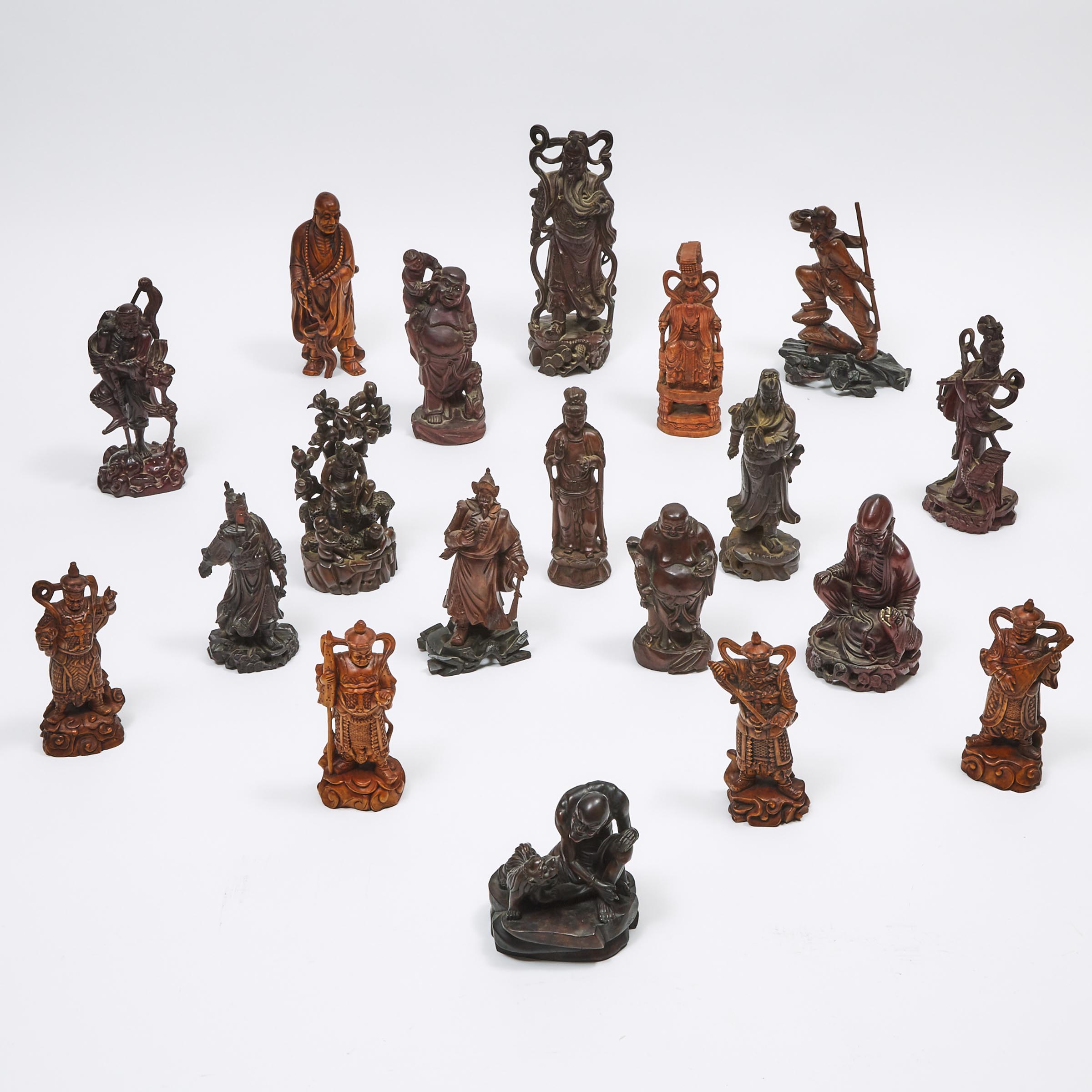 A Group of Nineteen Chinese Wood Carved Figures