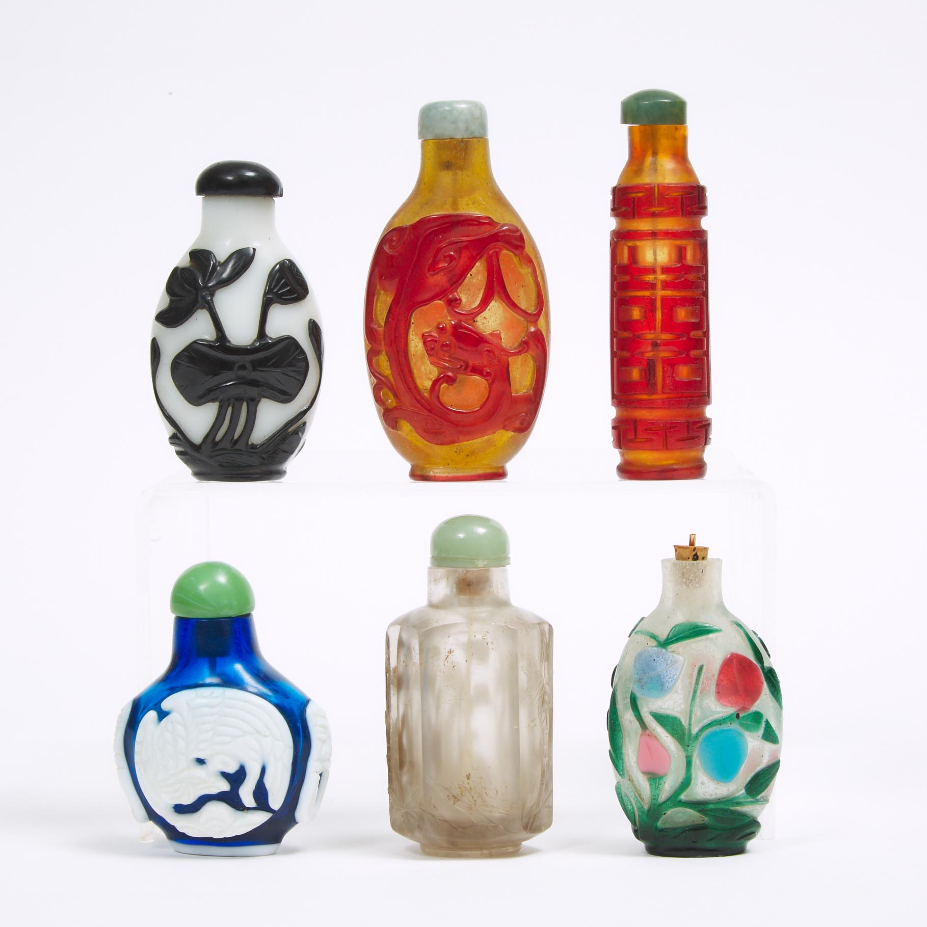 A Group of Five Overlay Glass Snuff Bottles, together with a Faceted Rock Crystal Snuff Bottle