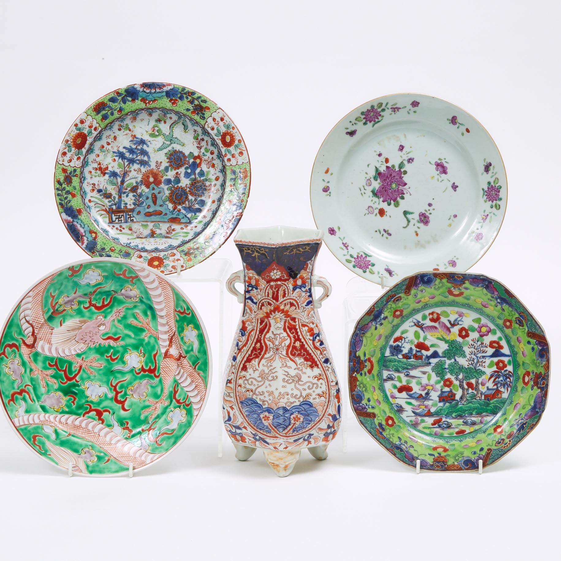 A Group of Four Porcelain Plates, together with a Chinese Imari Vase