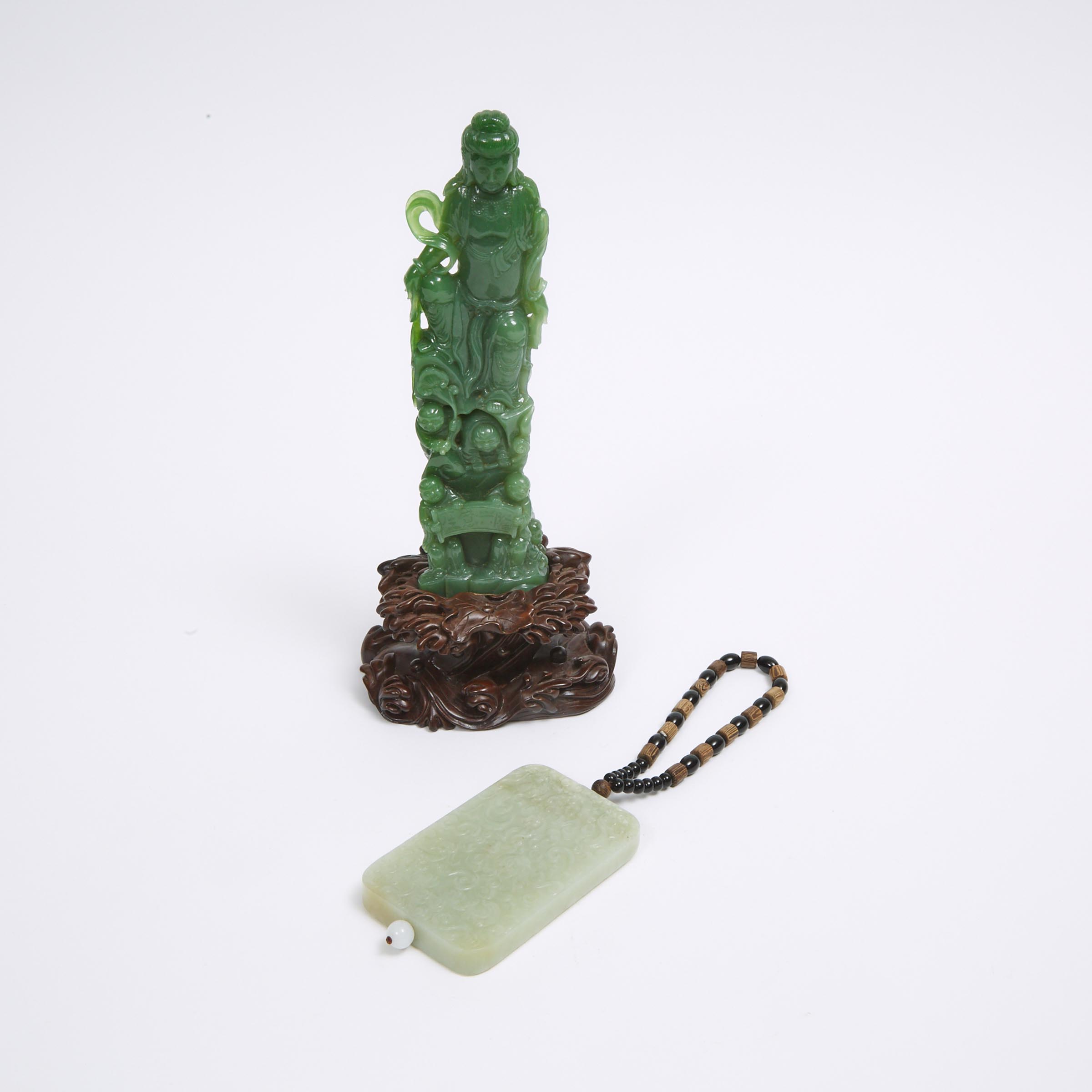 A Carved Pale Celadon Jade Rectangular Plaque, together with a Guanyin Group