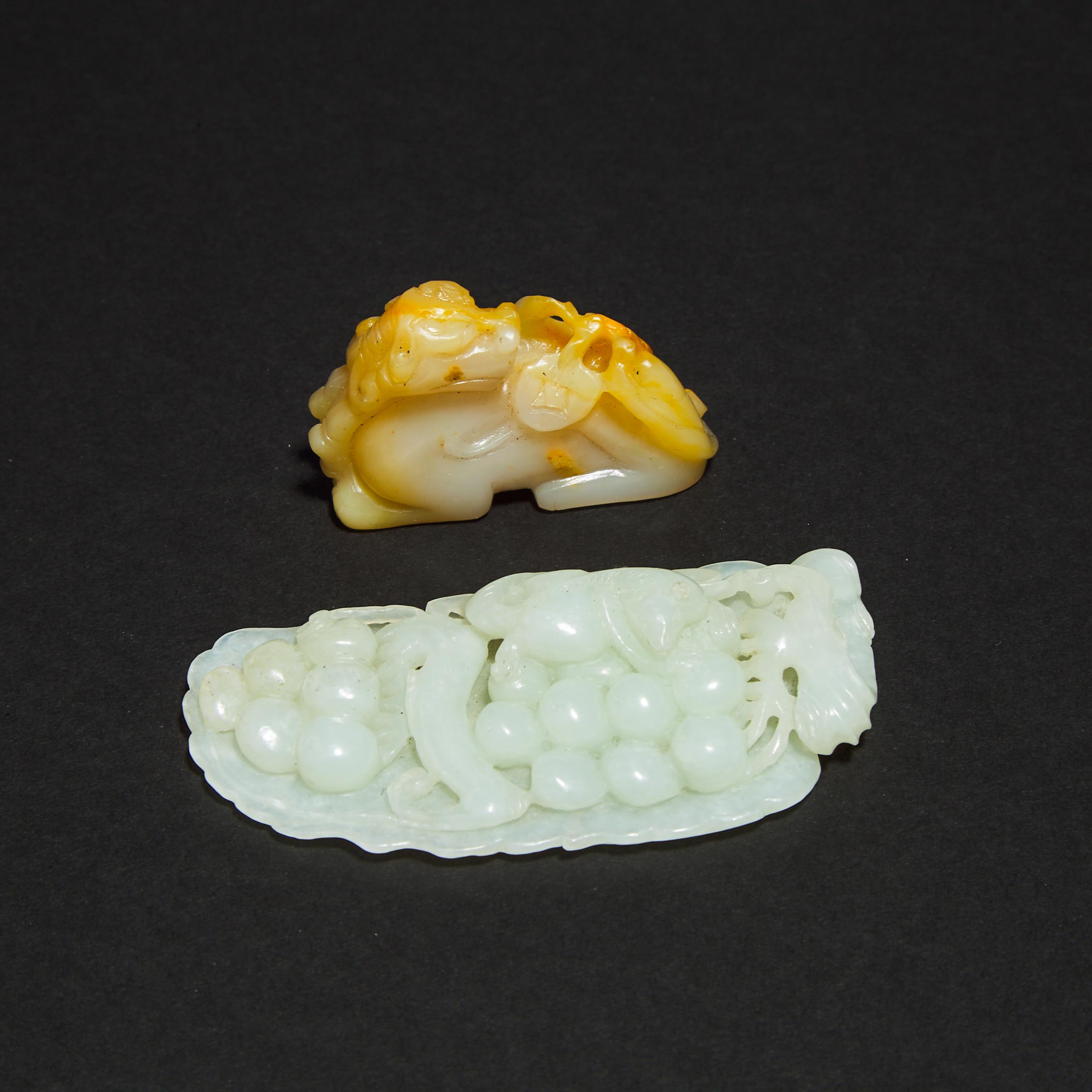 A Carved White Jade 'Squirrel and Grape' Pendant, together with a White and Russet Jade Mythical Beast