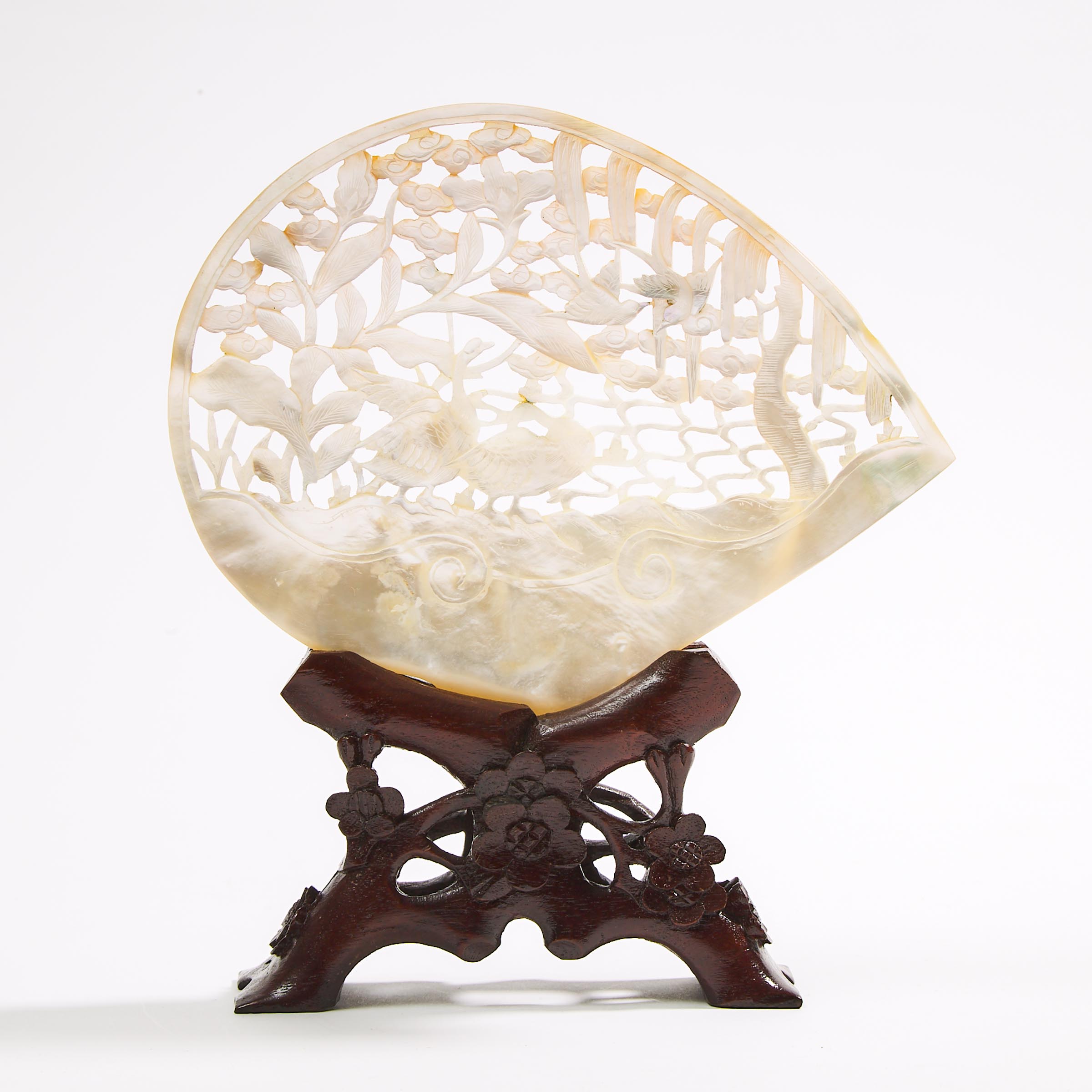 A Chinese Carved Mother-of-Pearl Shell on Stand