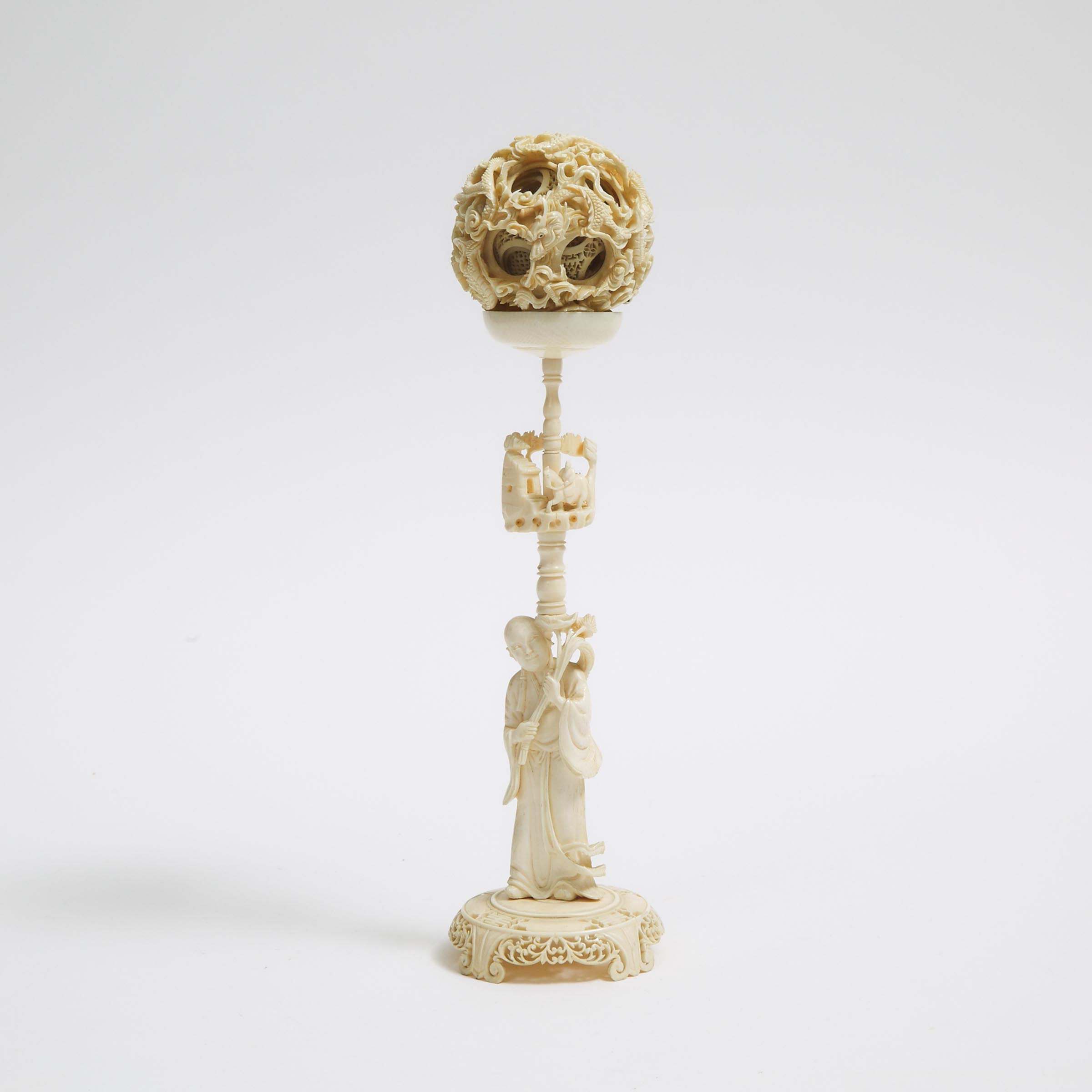A Chinese Ivory Puzzle Ball and Stand, Early 20th Century