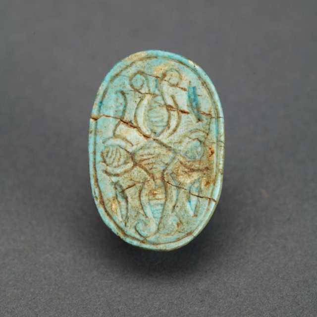 Egyptian Bronze Ushabti Figure of Osiris, 18th dynasty, 1500 B.C.,together with a Faience Scarab Seal, Ptolemaic Period, 3rd-1st century B.C. 