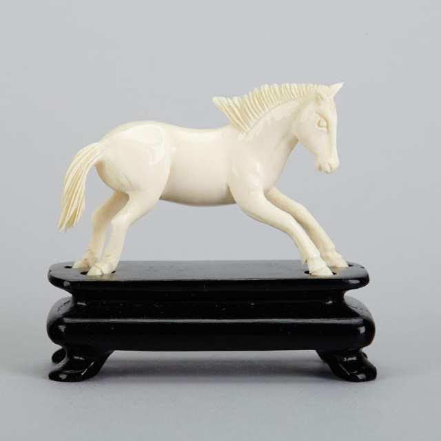 Set of Eight Ivory Carved Miniature Horses