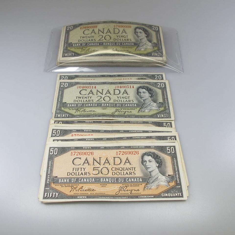 11 Canadian 1954 $50 and 80 Canadian 1954 $20 Bank Notes