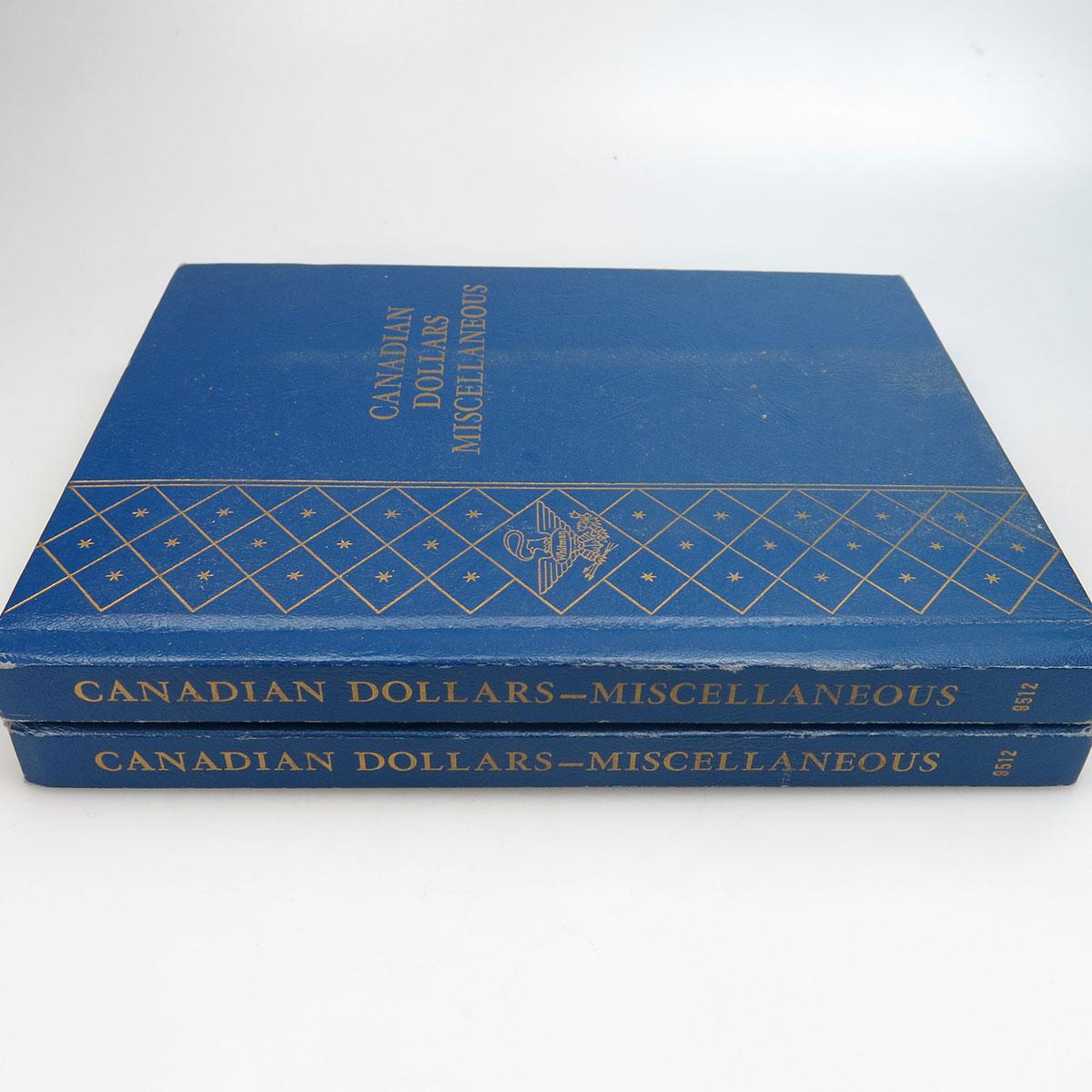 2 Collector’s Binders Of Canadian Silver Dollars