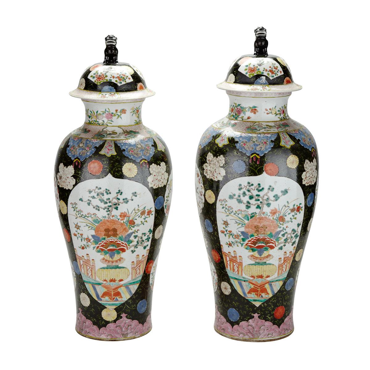 Pair of Famille Rose Black Ground Jars and Covers
