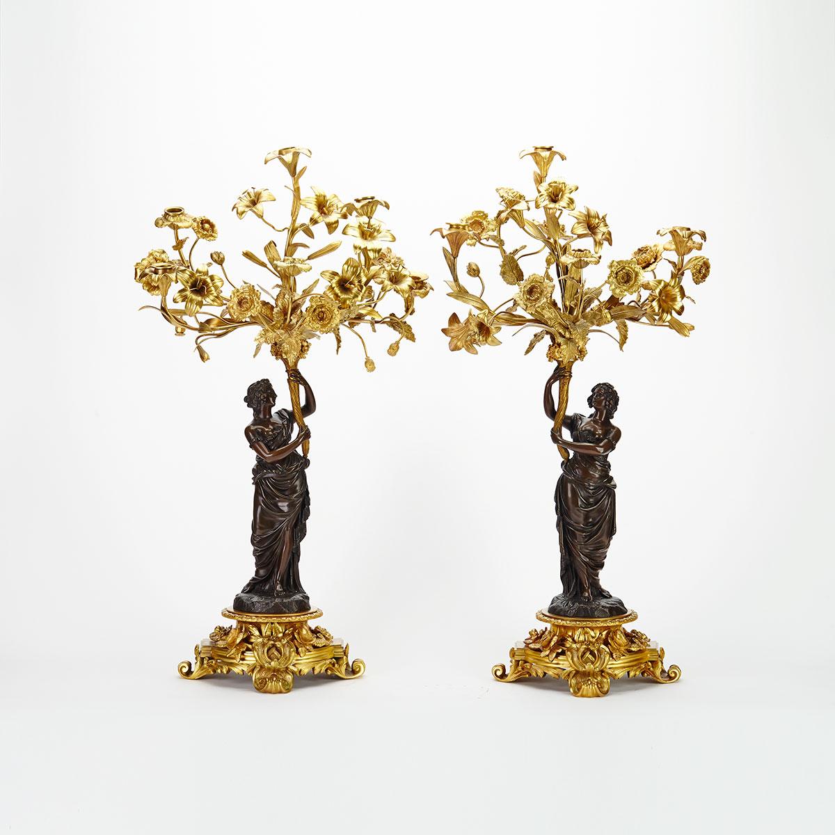 Pair of French Gilt and Patinated Bronze Figural Candelabra, early 20th century