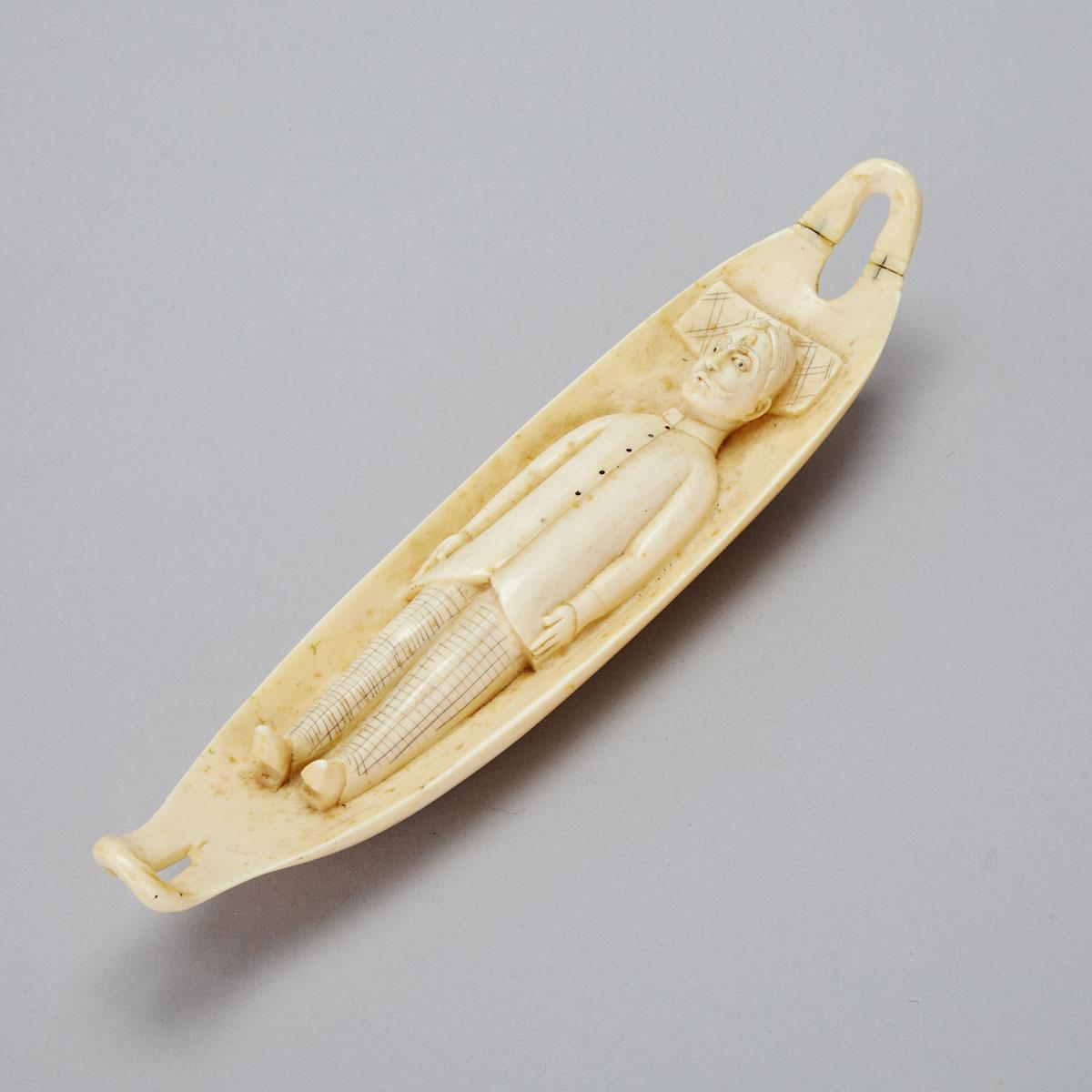 Indian Carved Ivory Figure of Gentleman Laying in Boat, 19th century