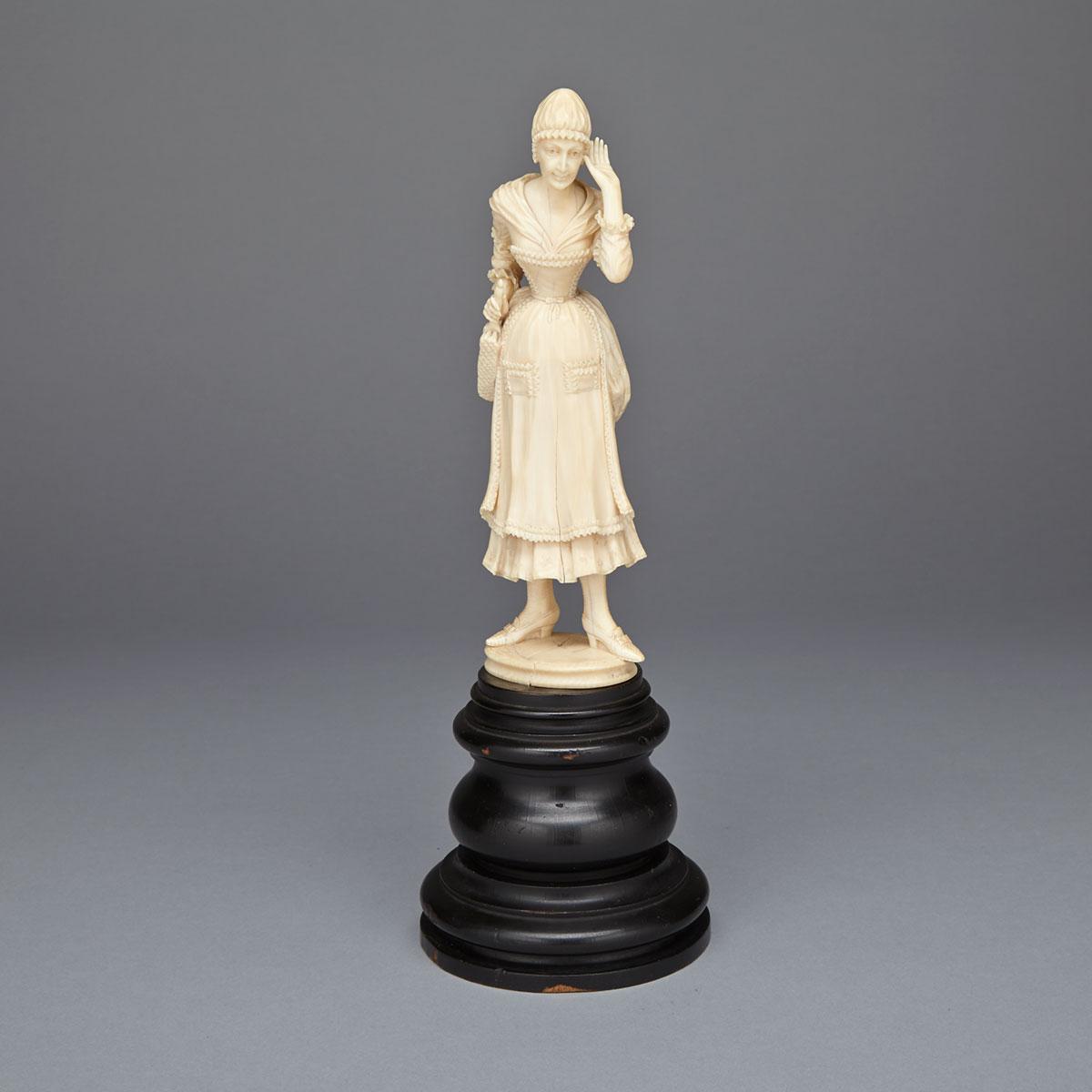 Dieppe Carved Ivory Figure of an Eavesdropping Charwoman, 19th century