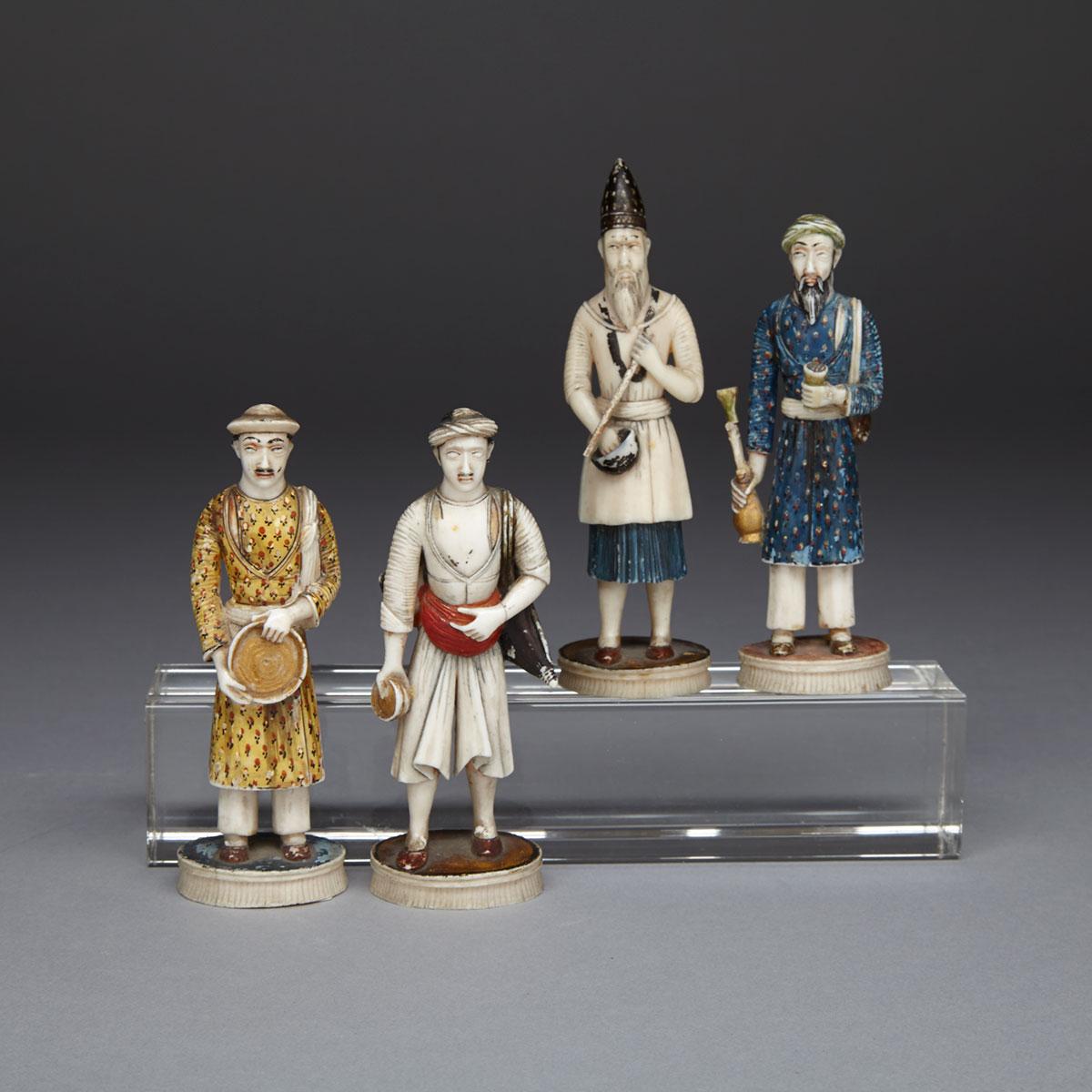 Four Persian Carved and Polychromed Ivory Figural Chess Pieces, 19th century or earlier