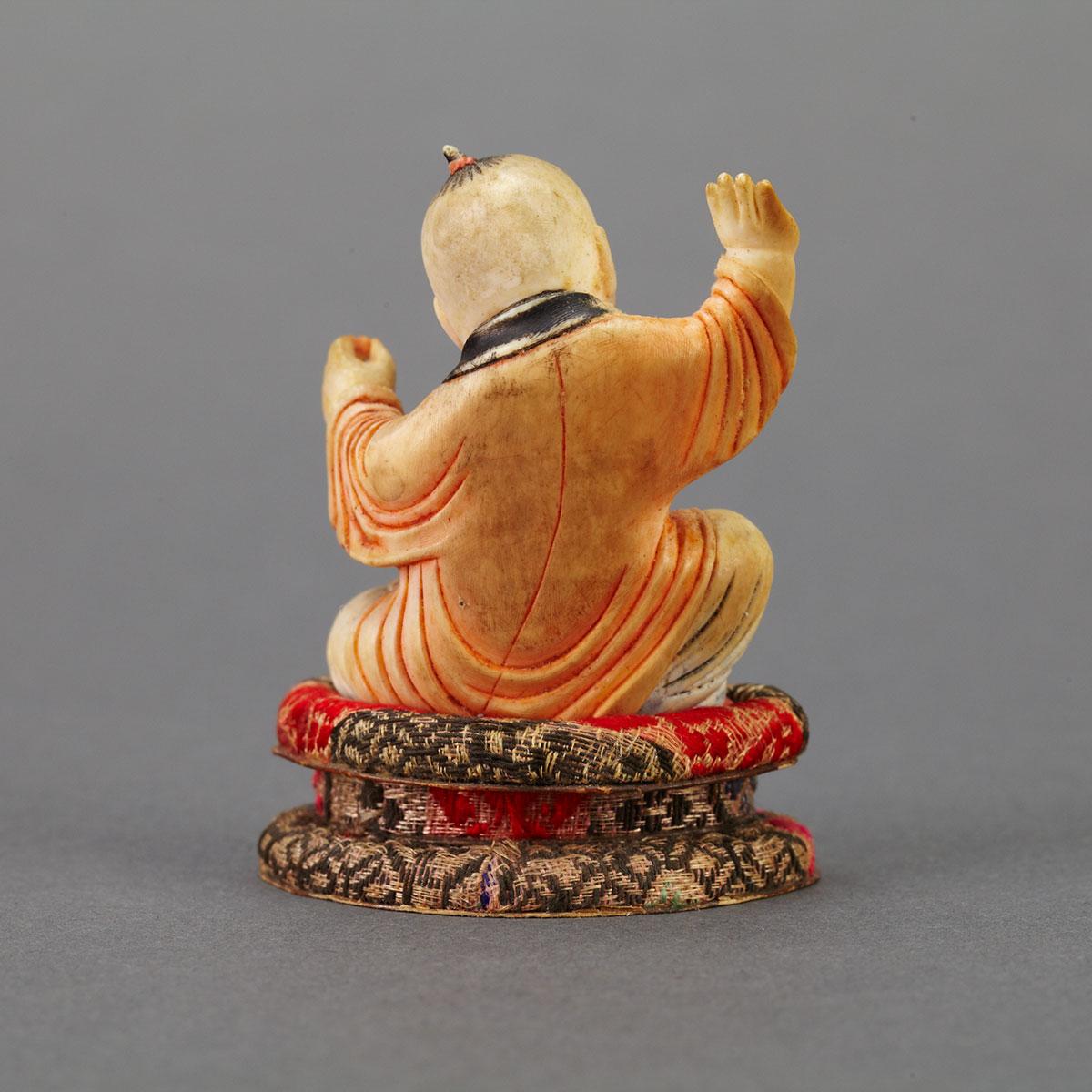 Small Tinted Ivory Figure of a Boy, 19th Century