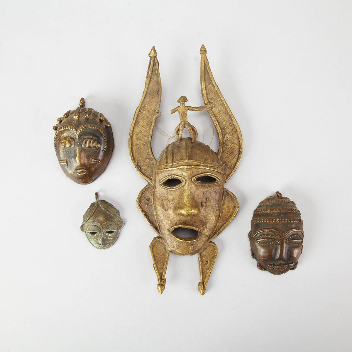 Group of Three Baule Bronze Masks, Ivory Coast