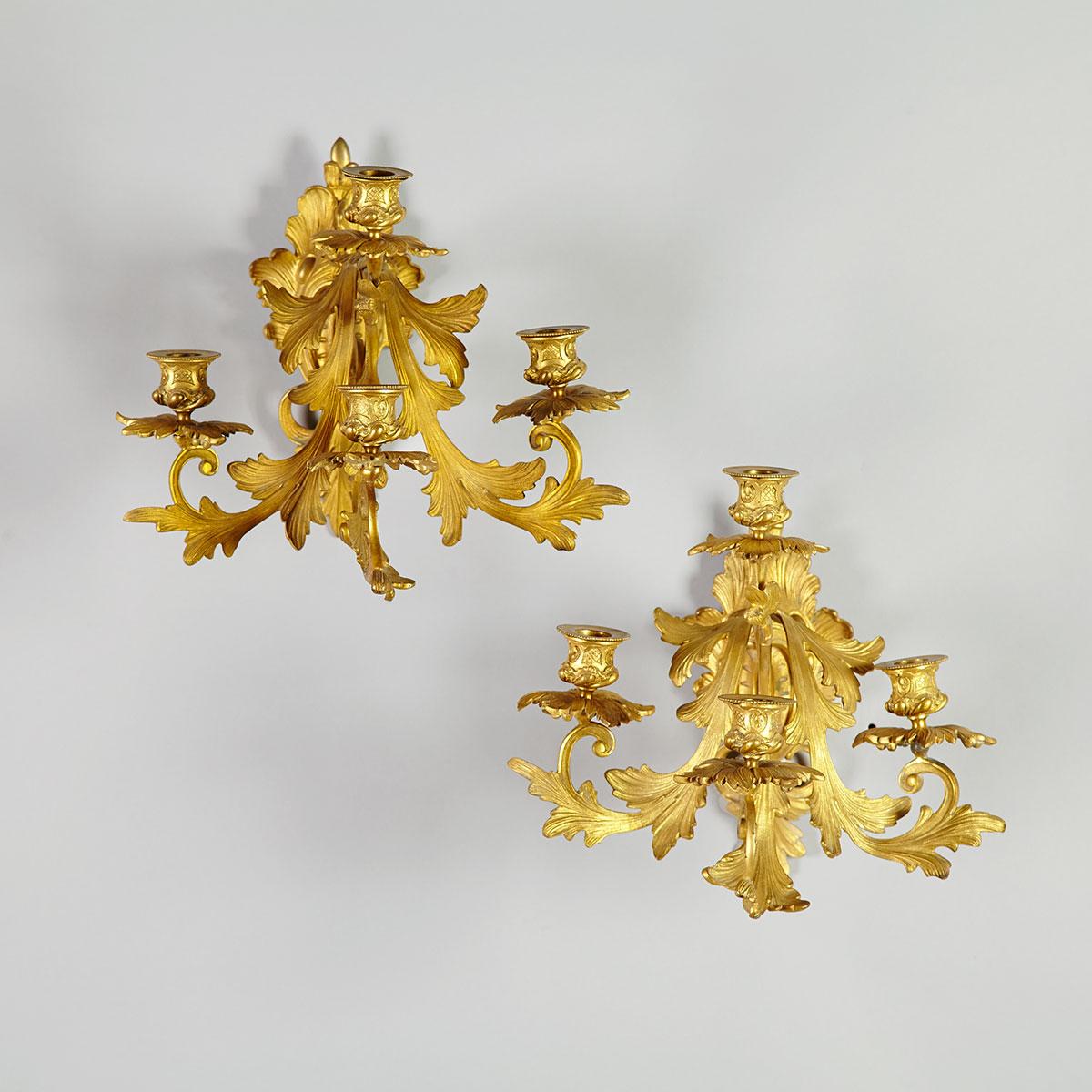 Pair of French Louis XV Style Gilt Bronze Four Light Wall Sconces, 19th century