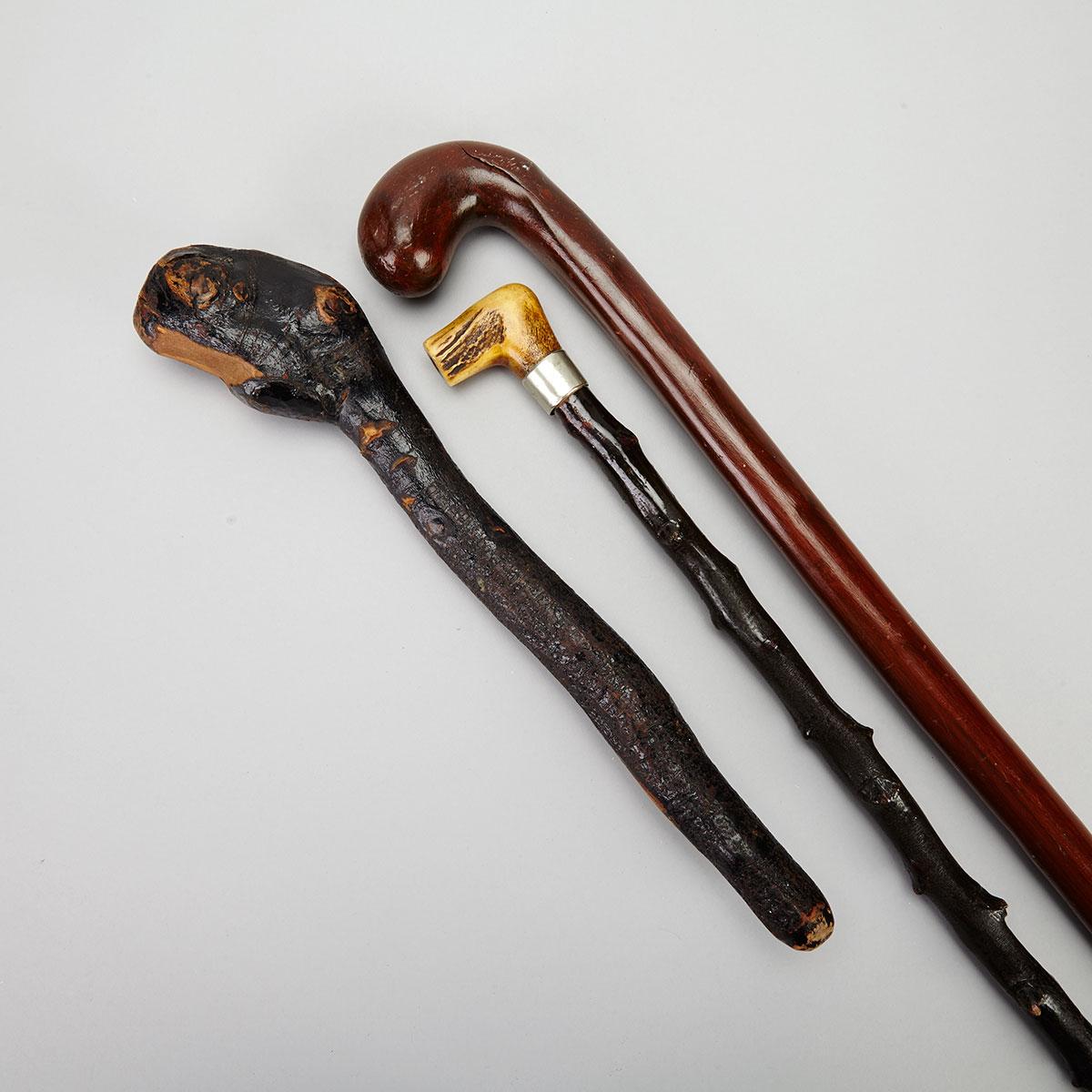 Black Thorn Walking Stick, a  Shillelagh and a Carved Hardwood Walking Stick, 19th century