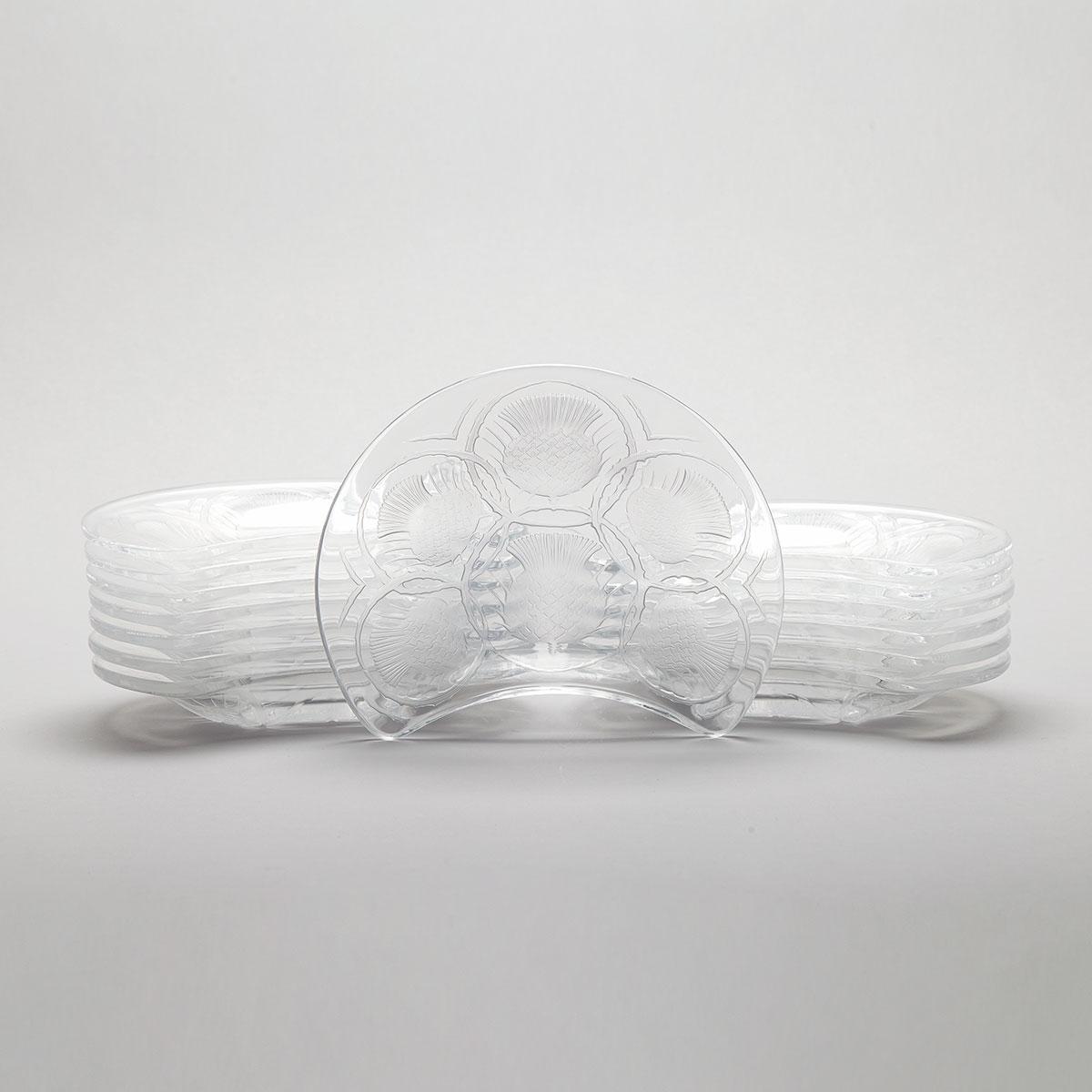 ‘Chardons’, Set of Twelve Lalique Moulded and Partly Frosted Glass Crescent Shaped Plates, post-1945