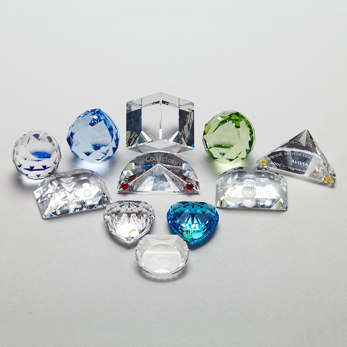 Four Swarovski Crystal Plaques and Seven Paperweights, late 20th/early 21st century