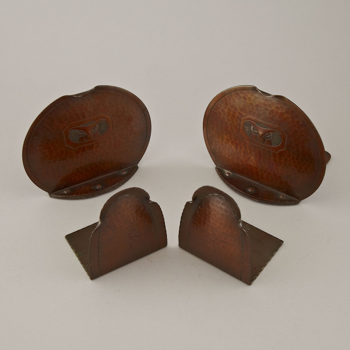 Two Pairs Roycroft Hammered Copper Bookends, early 20th century