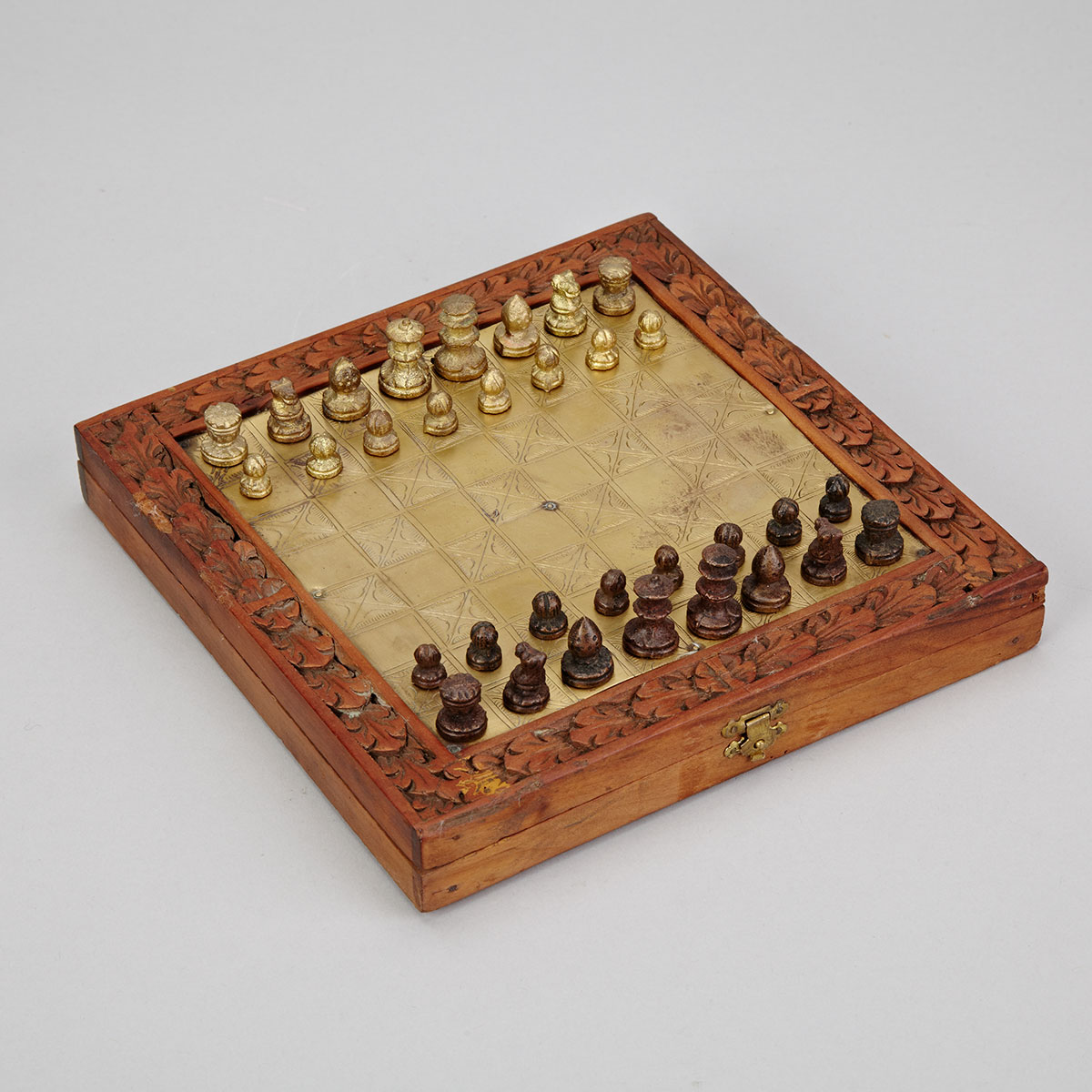 Myanmar (Burmese) Travelling Gilt and Patinated Bronze Chess Set, mid 20th century