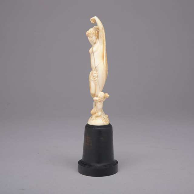 Small Continental Carved Ivory Group of a Classical Nude and Cherub, 19th century