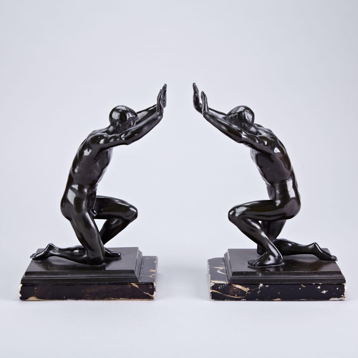 Pair of Patinated Metal Male Nude Figural Bookends, c.1930