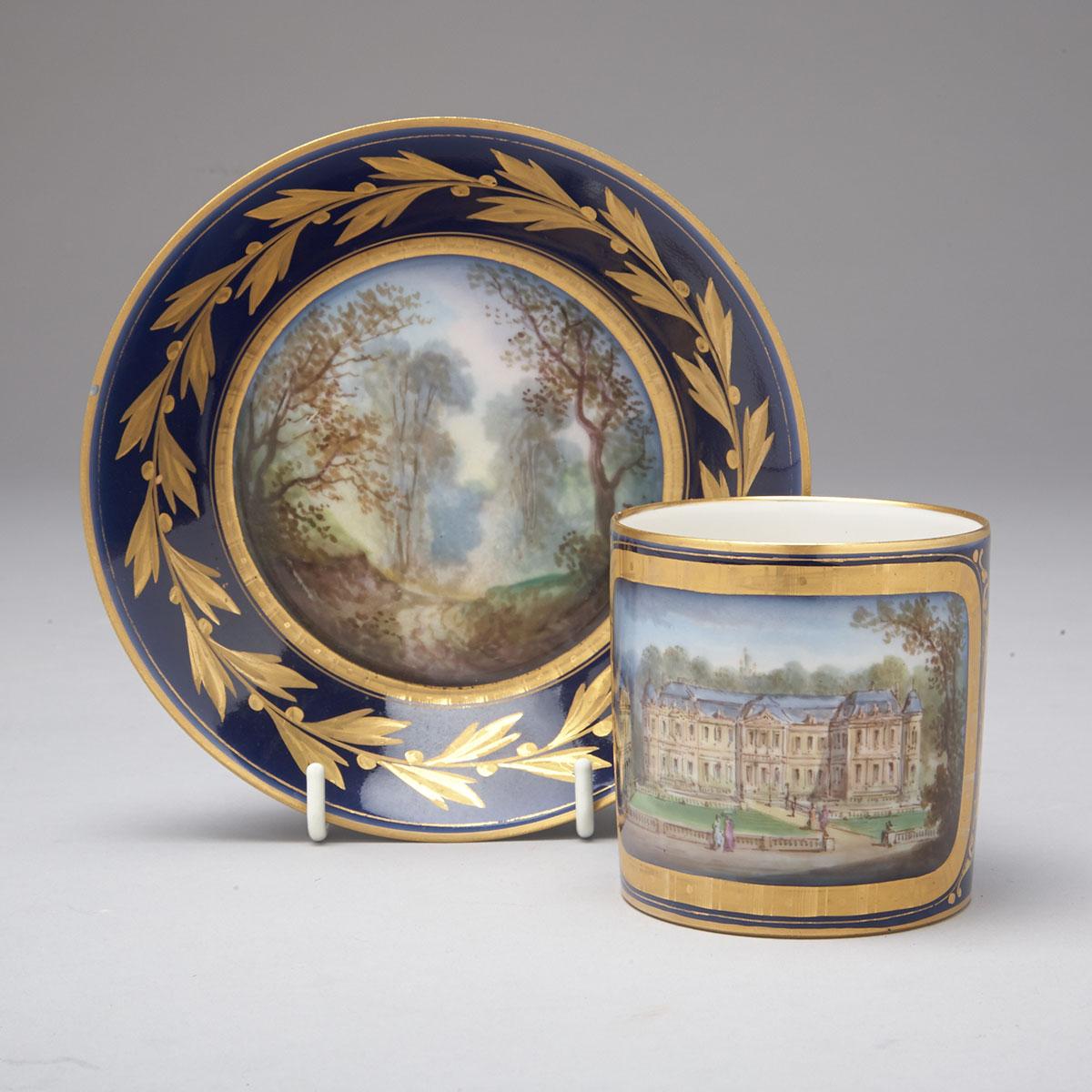 ‘Sèvres’ Blue and Gilt Ground Topographical Coffee Can and Saucer, late 19th century