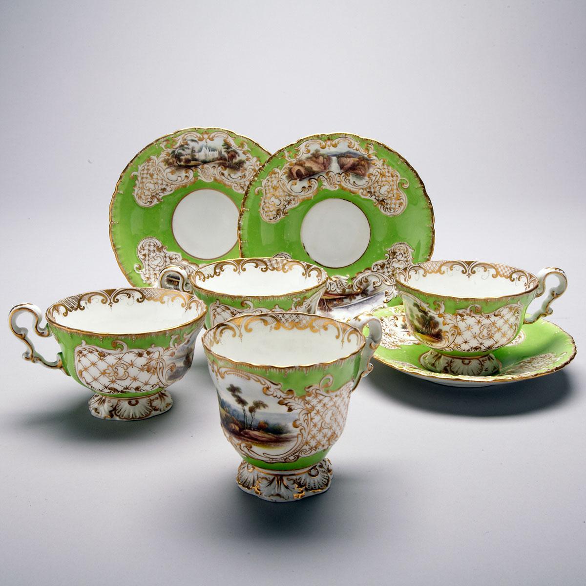 Two Copeland & Garrett Apple Green Ground Topographical Cups and Saucers and a Trio, c.1840