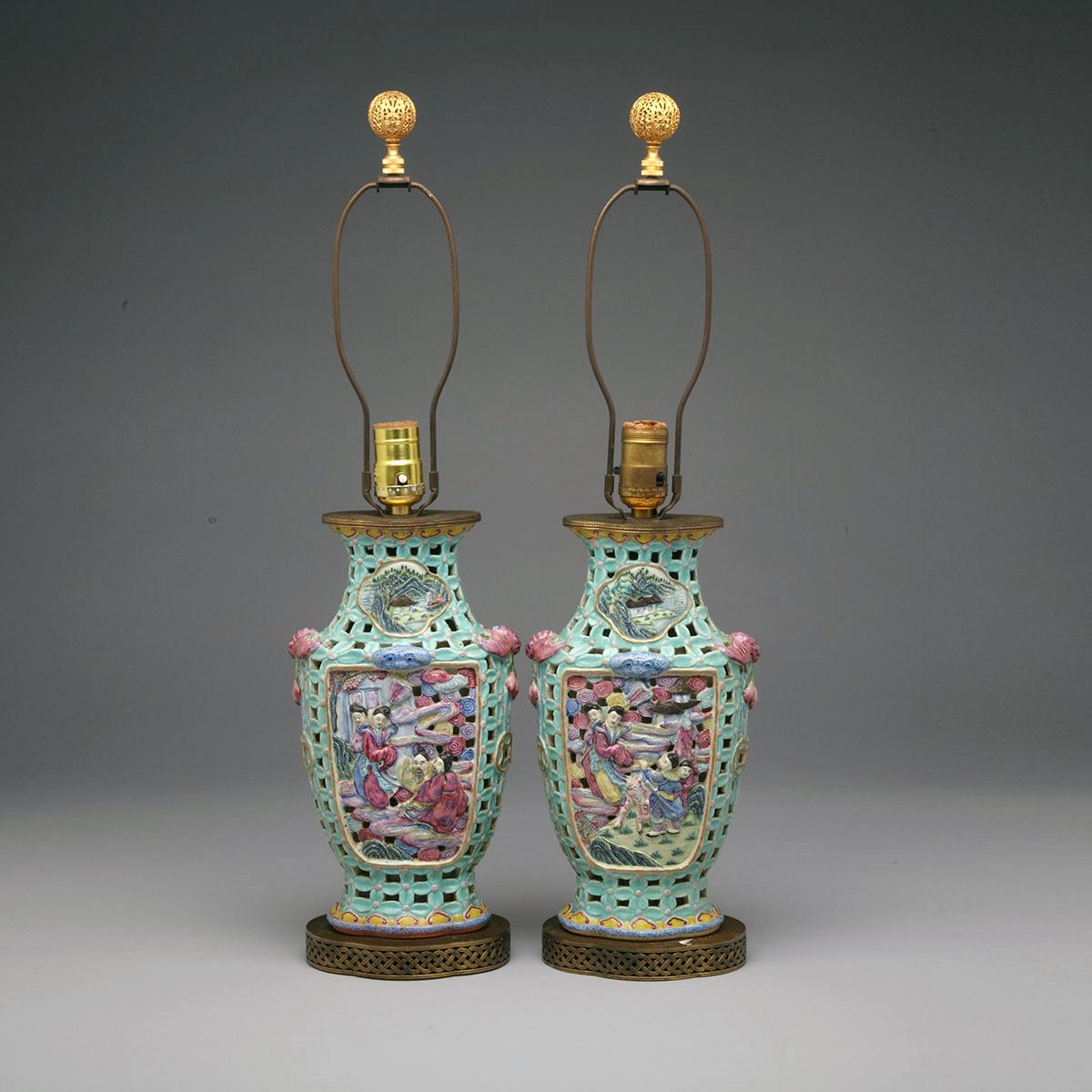 Pair of Famille Rose Moulded Figural Vases, Qianlong Mark, Early 20th Century