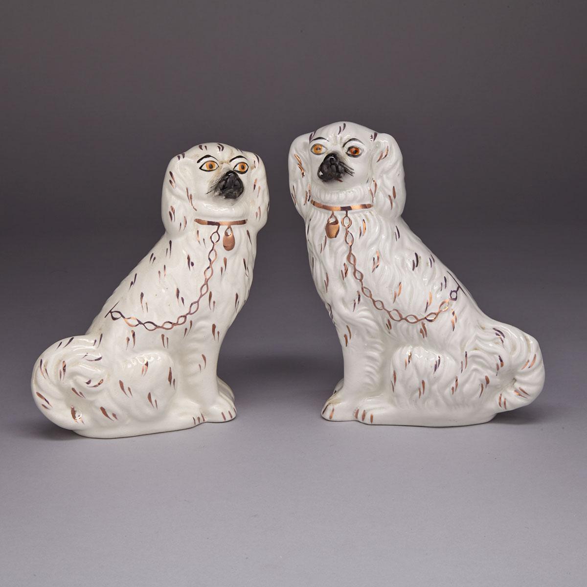 Pair of Staffordshire Pink Lustre Decorated Spaniels, late 19th century