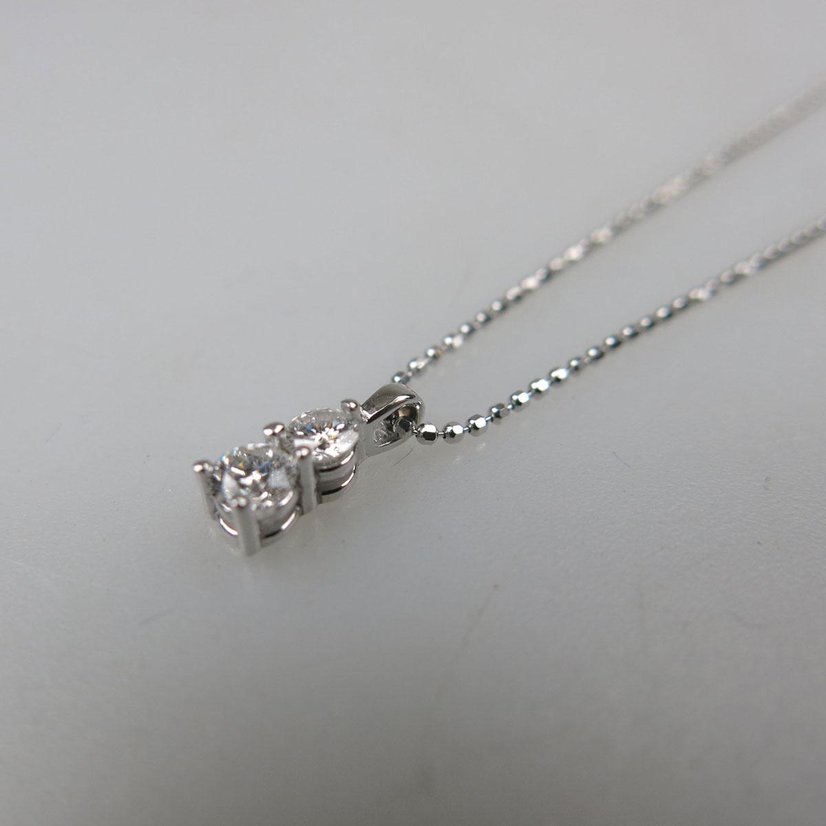 14k White Gold Chain and Pendant set with 2 brilliant cut Canadian diamonds (approx. 0.28ct.t.w.)