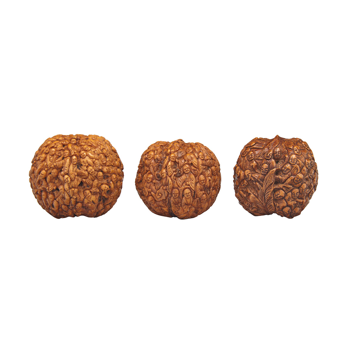 Three Well-Carved Large Walnuts