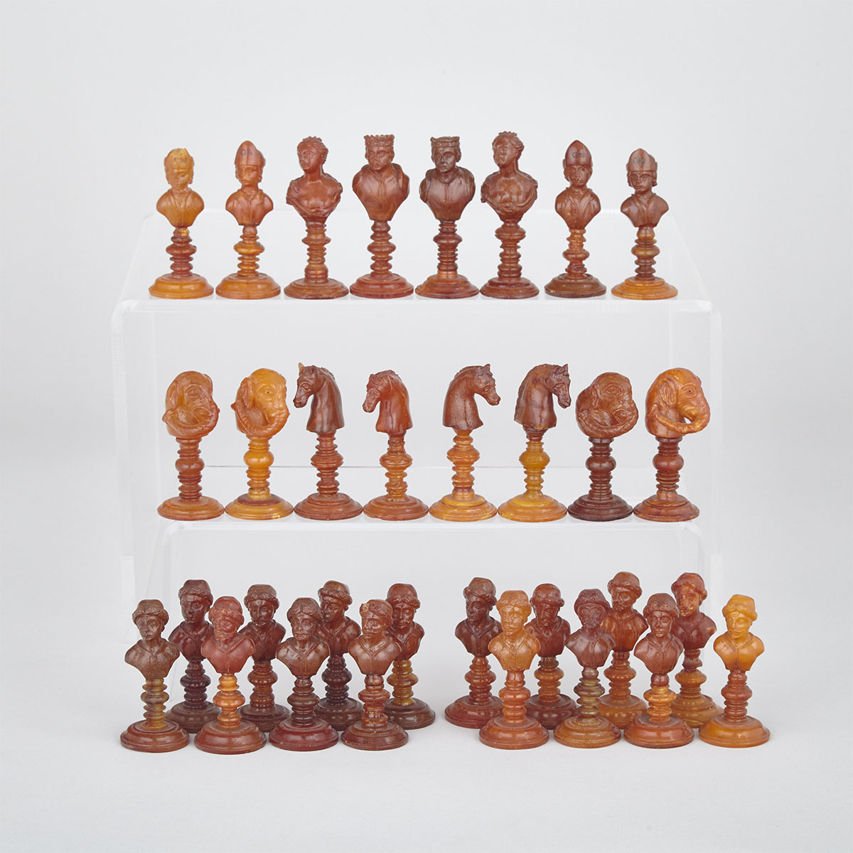 German Amber Bust Form Chess Set, Königsberg, 18th century