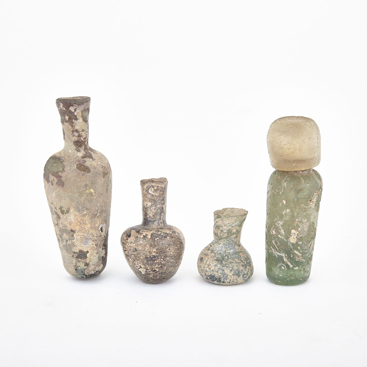 Group of Five Small Roman Glass Vessels, 2nd-3rd century AD