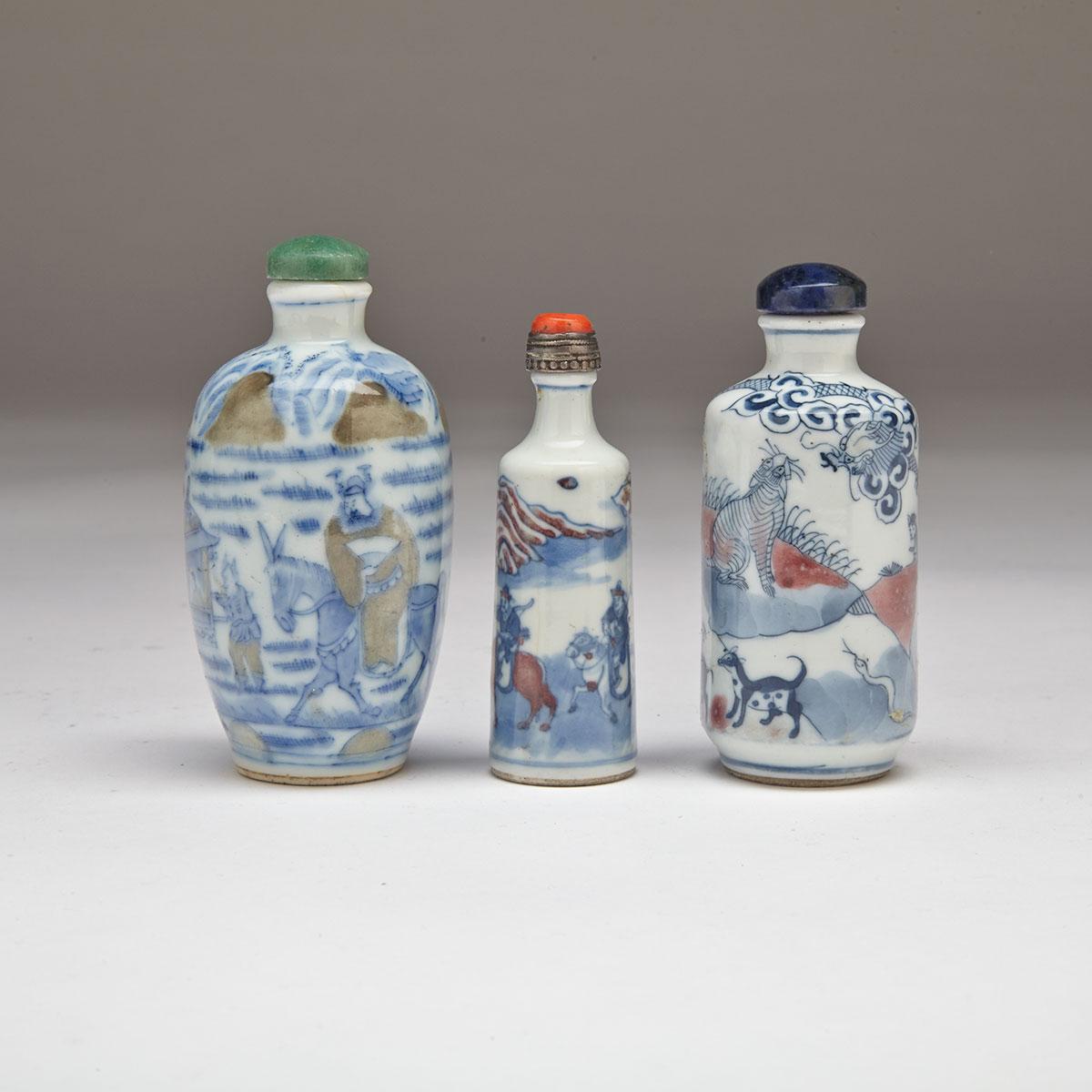 Three Blue, White and Copper Red Snuff Bottles, 19th Century
