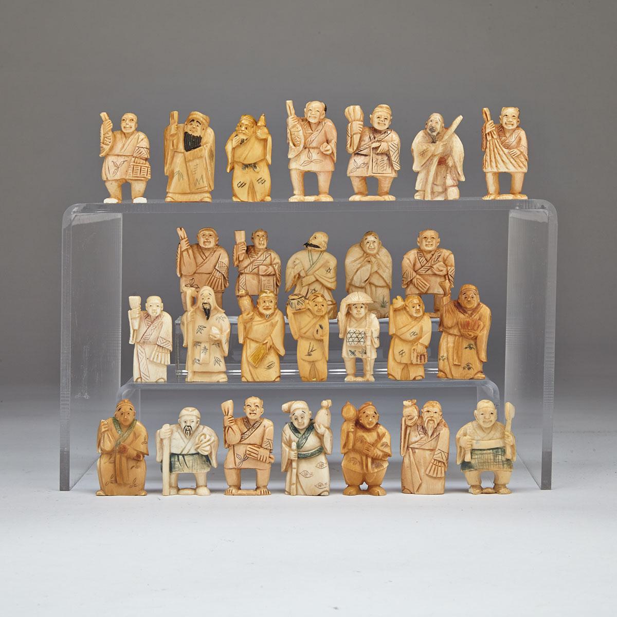 Group of 26 Stained Ivory Netsukes