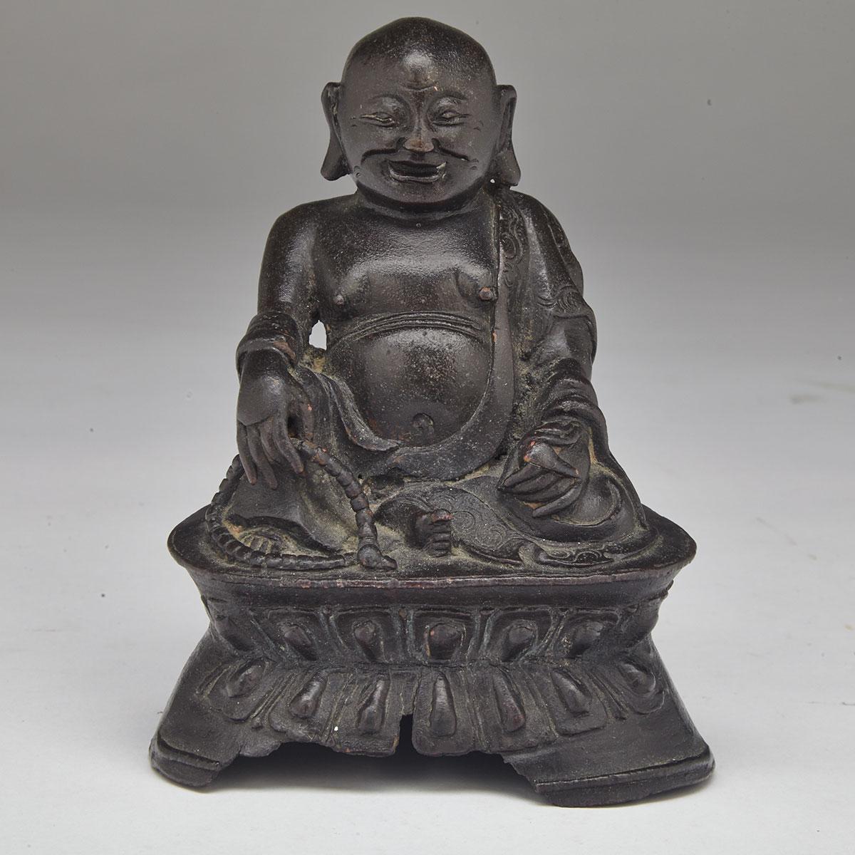Small Seated Bronze Figure of Putai, 16th/17th Century 