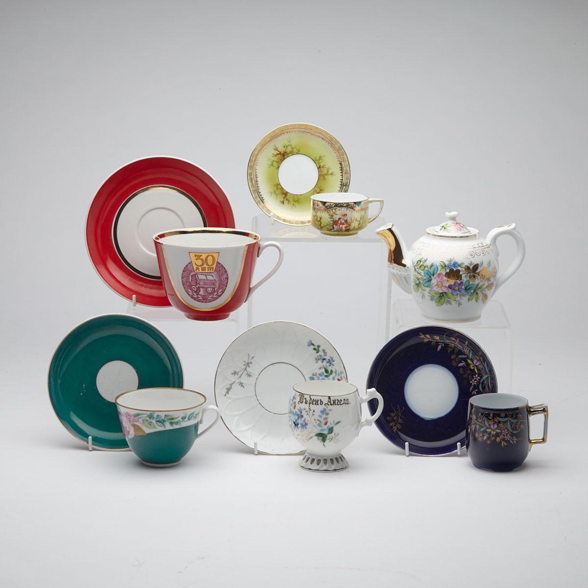 Group of Three Kuznetsov Cups and Saucers and a Teapot, Lomonosov Botanical Cup and Saucer and a Dulevo Guards Unit Cup and Saucer, mainly 20th century