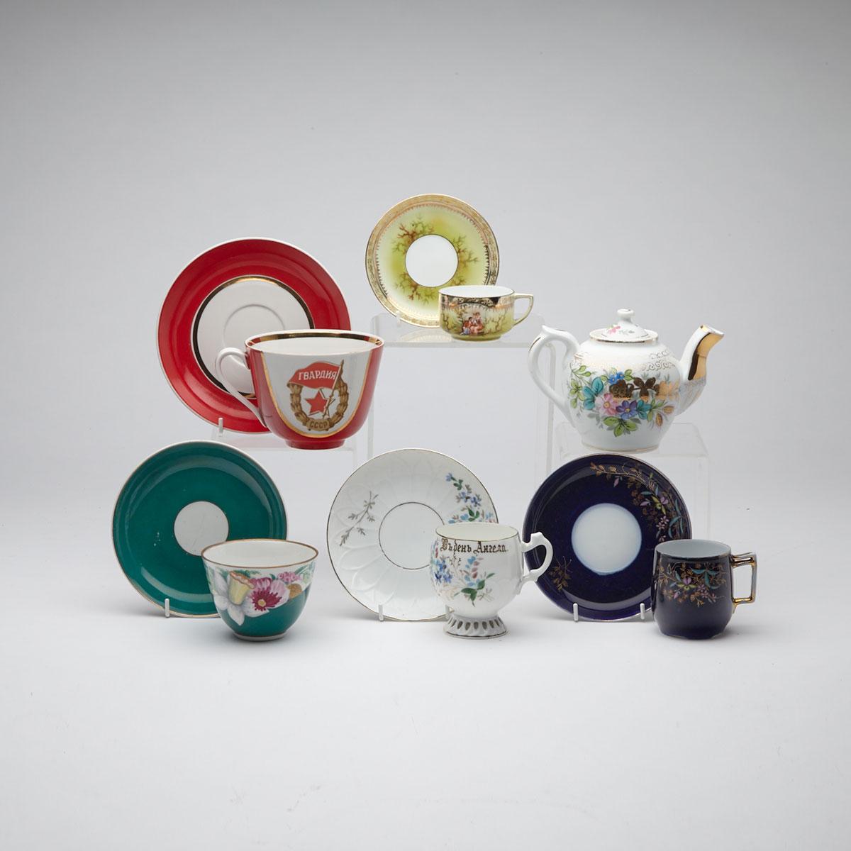 Group of Three Kuznetsov Cups and Saucers and a Teapot, Lomonosov Botanical Cup and Saucer and a Dulevo Guards Unit Cup and Saucer, mainly 20th century